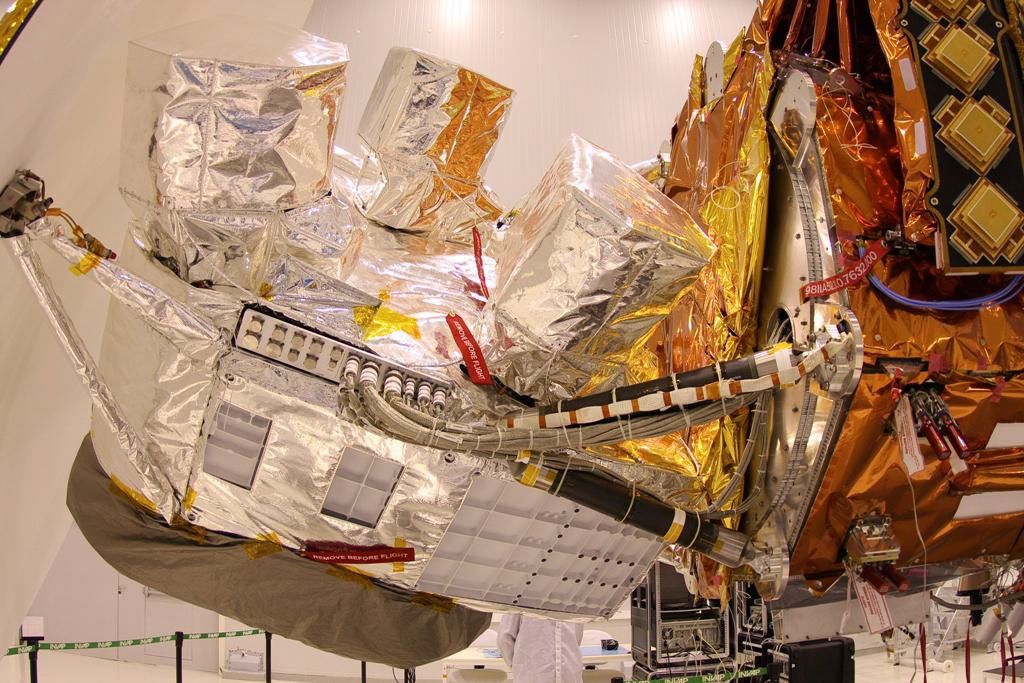 NASA's Aquarius instrument, covered in silver foil, is shown attached to the SAC-D satellite bus at INVAP facility.