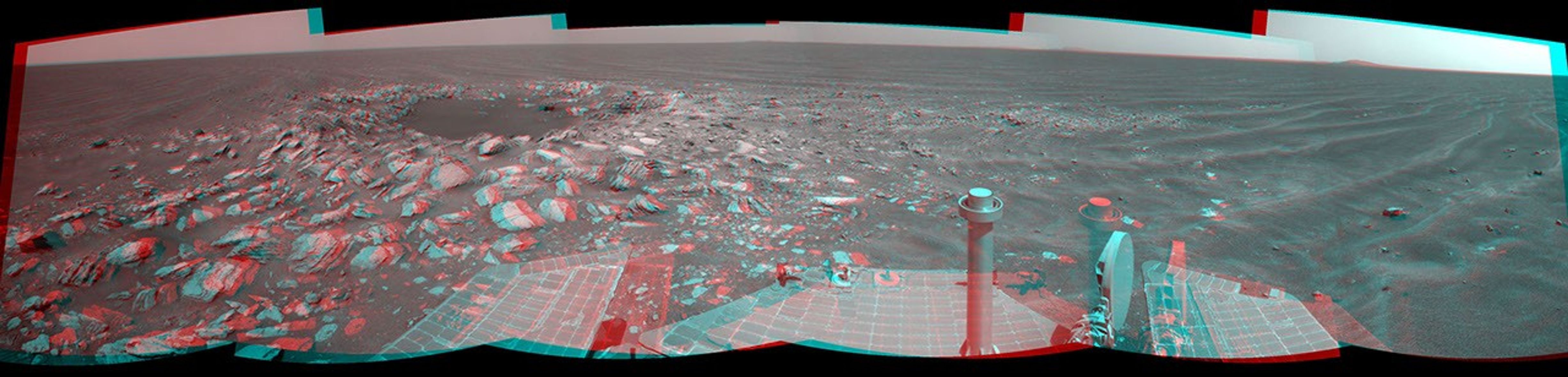 NASA's Mars Exploration Rover Opportunity captured this stereo view of a wee crater, informally named 'Skylab,' along the rover's route. This crater was likely formed within the past 100,000 years. 3D glasses are necessary to view this image.