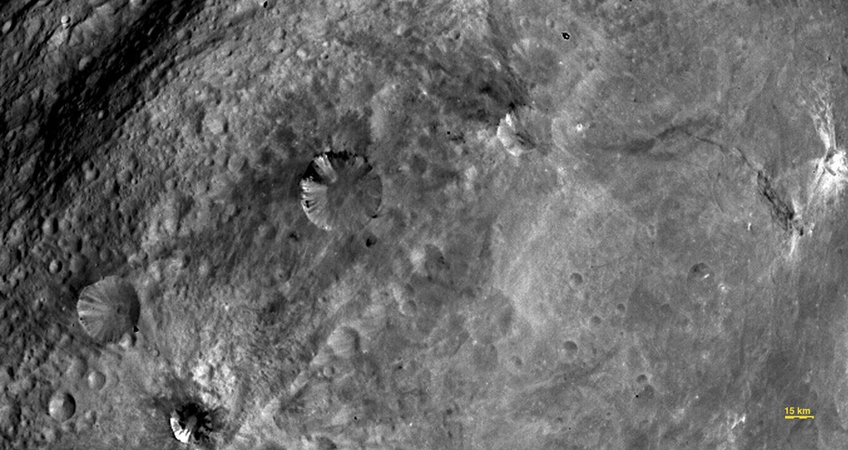 In this image, obtained by the framing camera on NASA's Dawn spacecraft, various craters are visible in the southern equatorial region of the giant asteroid Vesta.