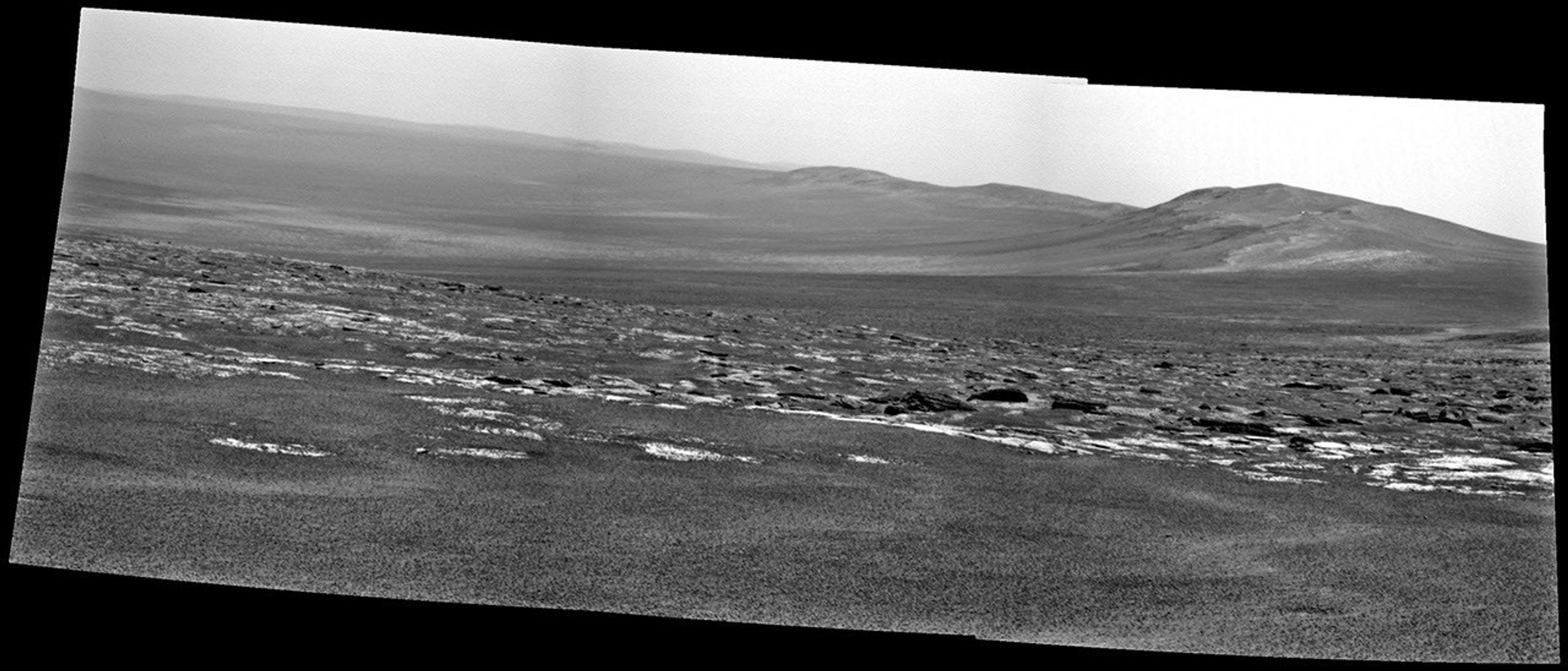 NASA's Mars Exploration Rover Opportunity captured this view of a portion of Endeavour crater's rim after a drive on Aug. 4, 2011 to reach 'Spirit Point,' the chosen arrival site.