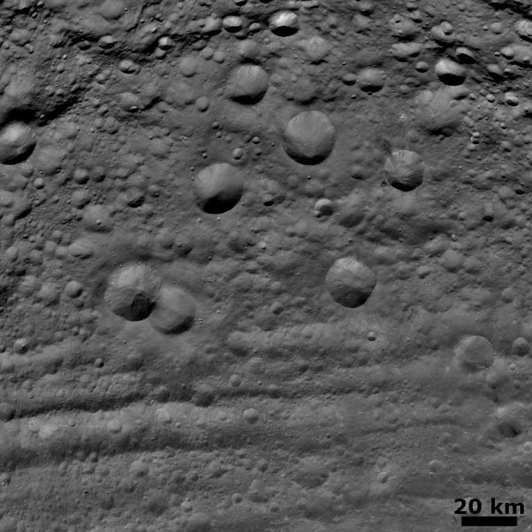This image from NASA's Dawn spacecraft shows craters in various states of degradation on the asteroid Vesta.