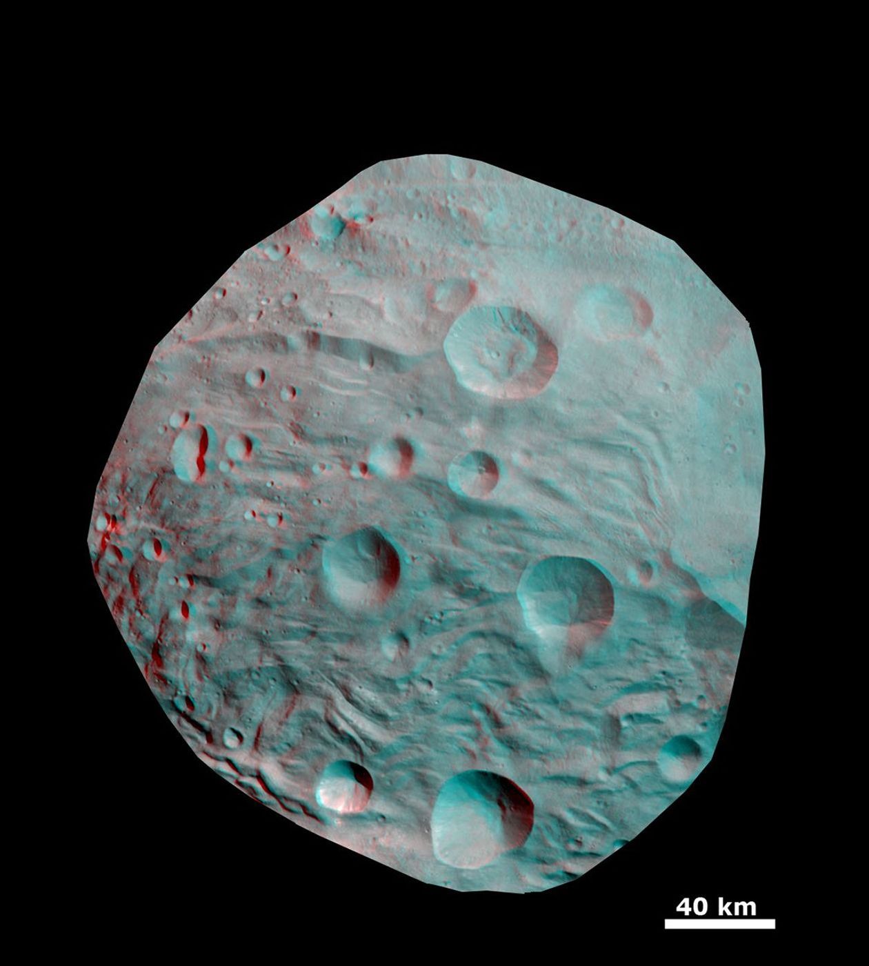 This 3D image shows the topography of craters and grooves of asteroid Vesta's south polar region obtained by the framing camera instrument aboard NASA's Dawn spacecraft on Aug. 23 and 28, 2011. You need 3D glasses to view this image.