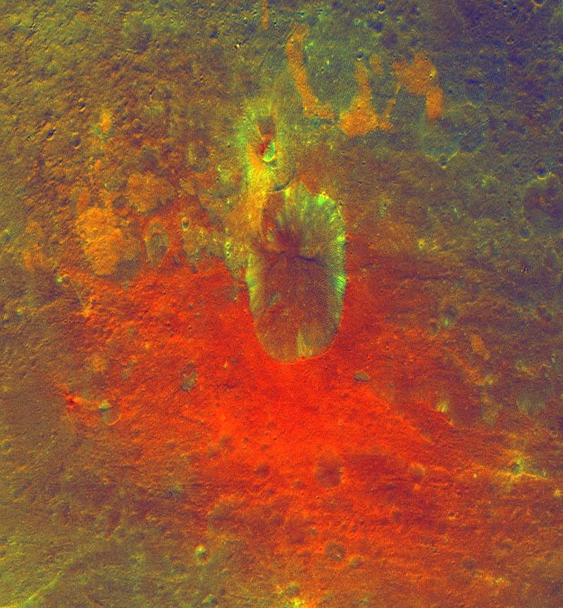 This false-color image obtained by NASA's Dawn spacecraft shows a crater on the giant asteroid Vesta. The reddish coloring below the crater points to material that was hurled from Vesta's interior during an impact or originated from the impactor itself.