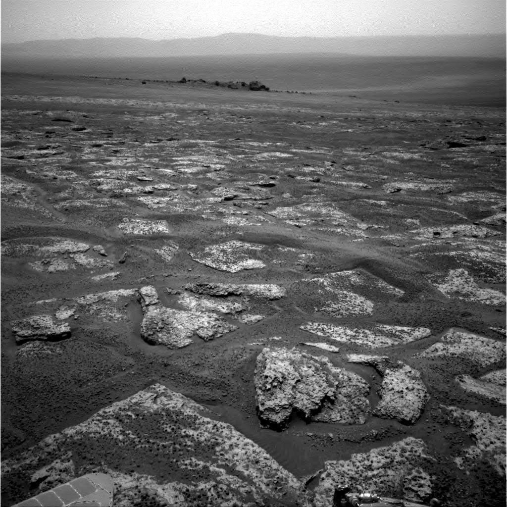 This image from the navigation camera on NASA's Mars Exploration Rover Opportunity shows the view ahead on the day before the rover reached the rim of Endeavour crater. It was taken during the 2,680th Martian day, or sol, of the rover's work on Mars.