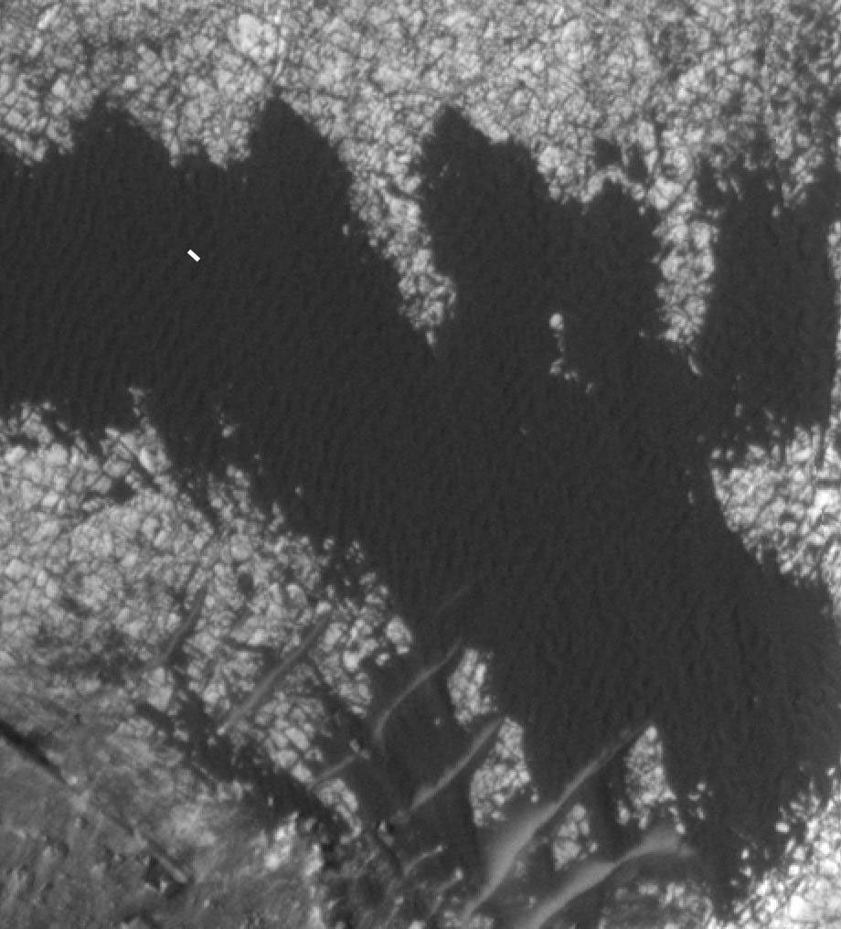 A rippled patch of sand in Becquerel Crater on Mars moved about two meters (about two yards) between November 24, 2006 and September 5, 2010, in one of two images taken by NASA's Mars Reconnaissance Orbiter.