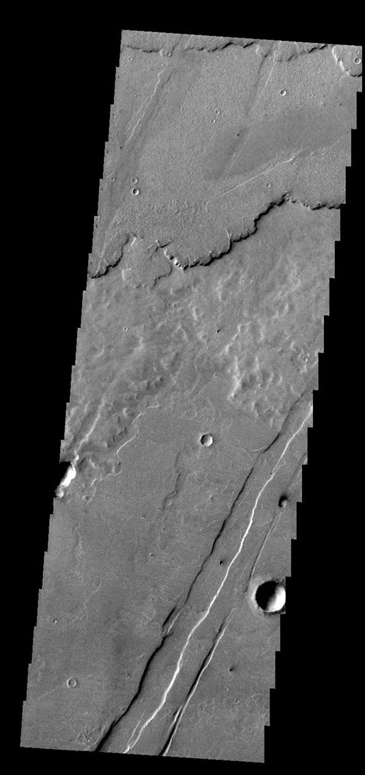 This image from NASA's 2001 Mars Odyssey shows several layers of lava flows one on top of the other.