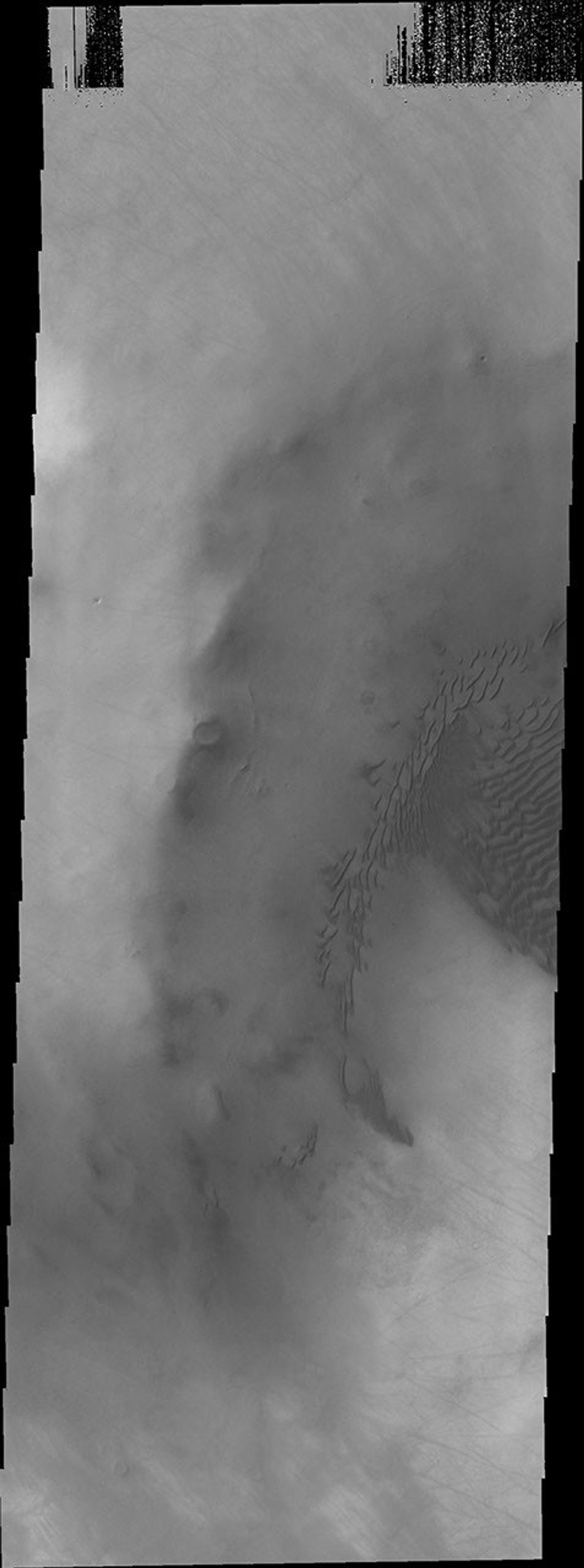 Terra Sirenum is the location of this image from NASA's 2001 Mars Odyssey spacecraft. The unnamed crater has dunes on its floor.