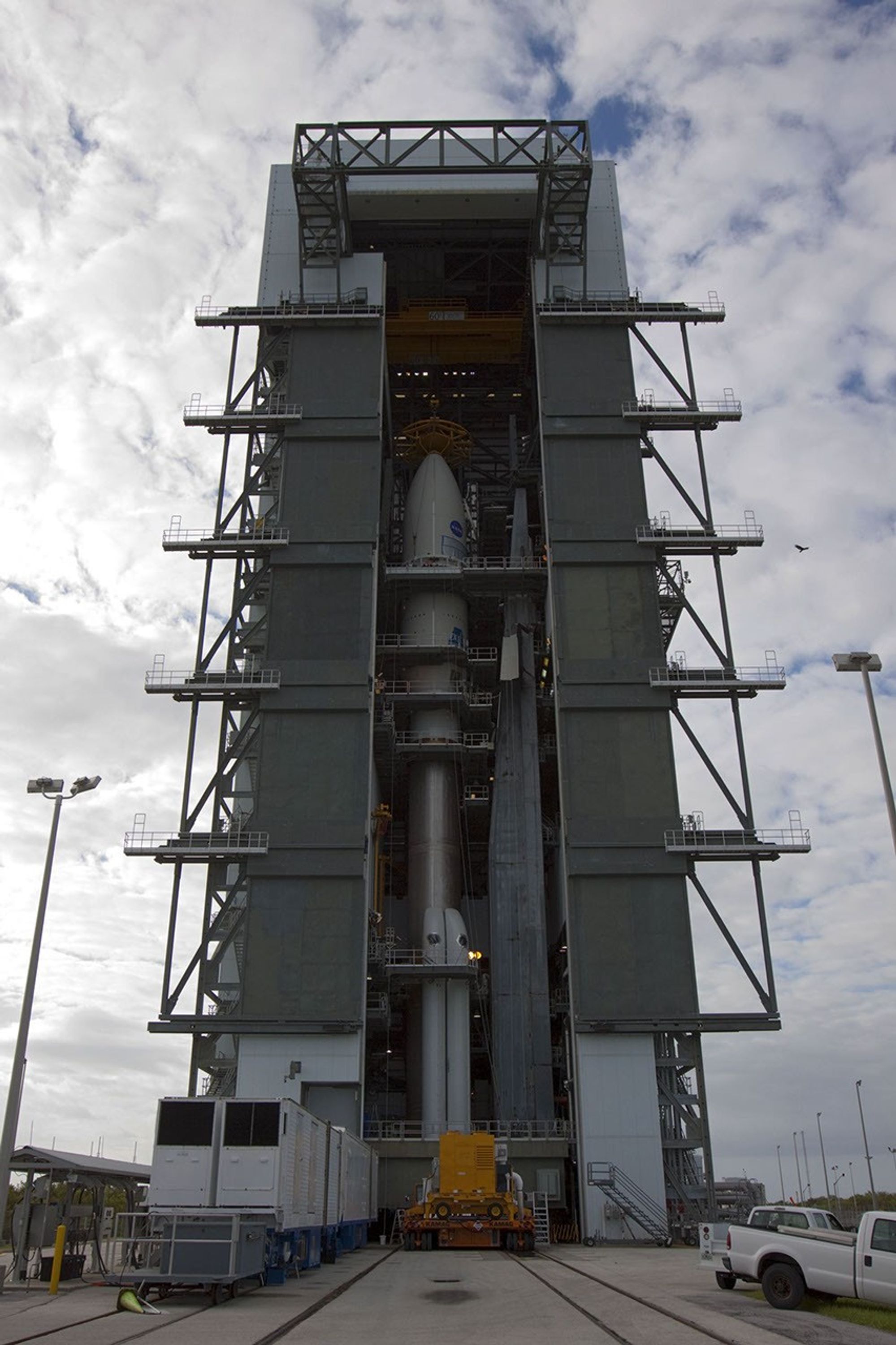 In the Vertical Integration Facility at Space Launch Complex 41, the payload fairing containing NASA's Mars Science Laboratory spacecraft was attached to its Atlas V rocket on Nov. 3, 2011.
