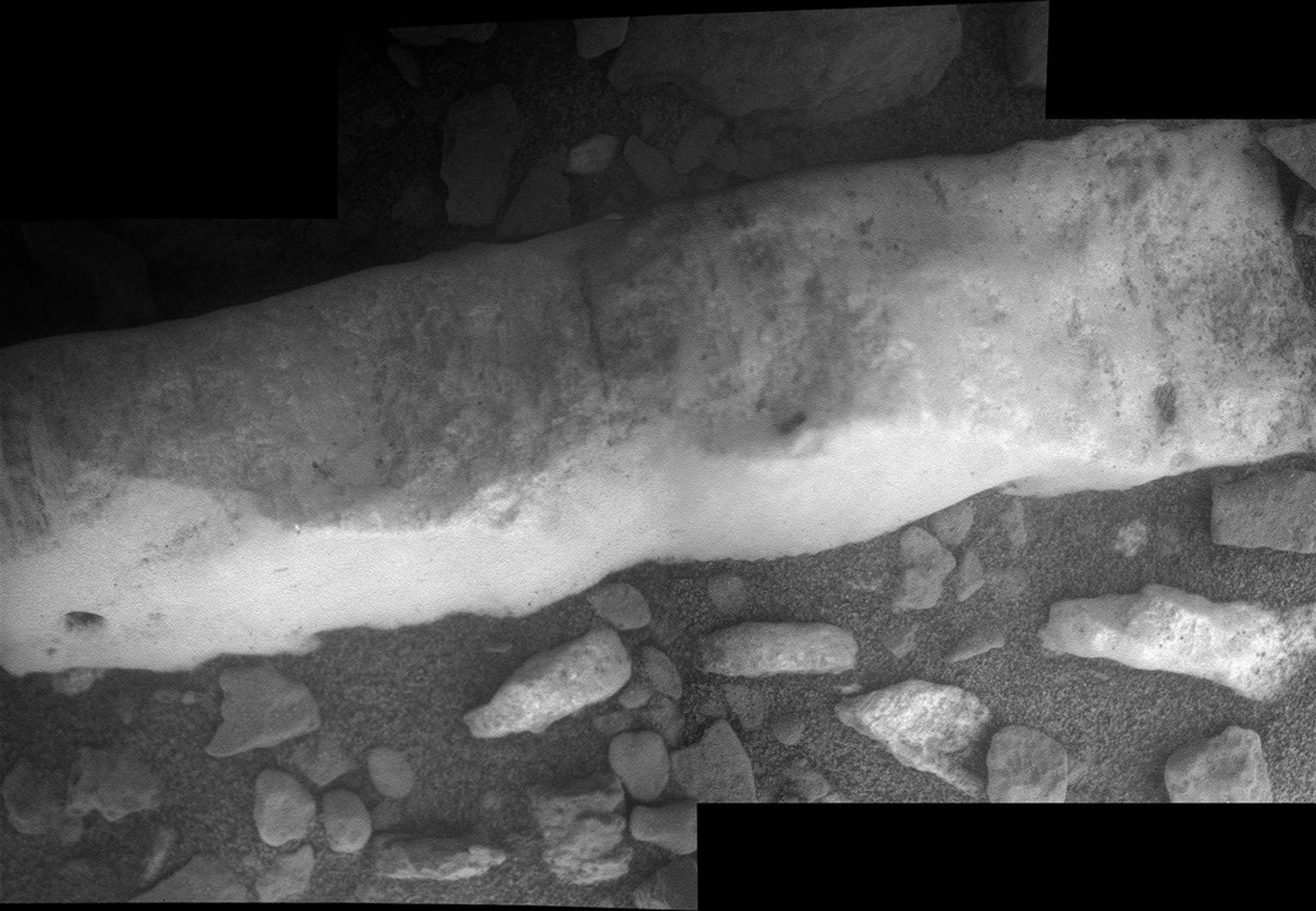This close-up view of a mineral vein called 'Homestake' comes from the microscopic imager on NASA's Mars Exploration Rover Opportunity; the vein is found to be rich in calcium and sulfur, possibly the calcium-sulfate mineral gypsum.