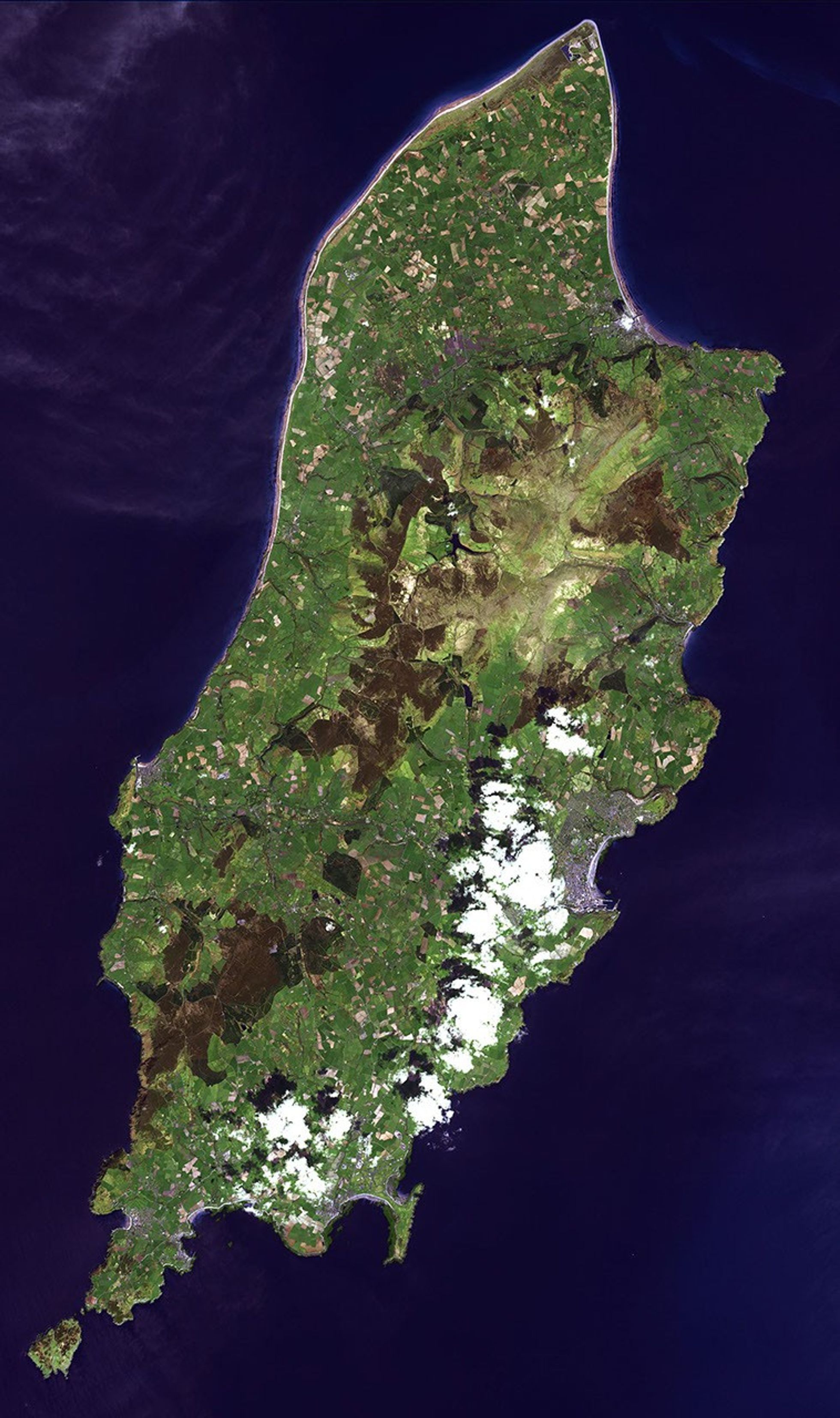 This image from NASA's Terra spacecraft is of the Isle of Man (also known as Mann), a self-governing British Crown Dependency in the Irish Sea between Great Britain and Ireland.