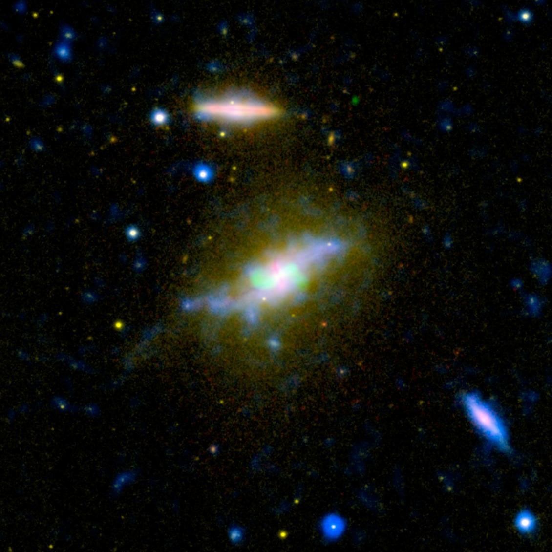 Time is running out for the galaxy NGC 3801, seen in this composite image from NASA's Galaxy Evolution Explorer and other instruments combining light from across the spectrum, ranging from ultraviolet to radio.