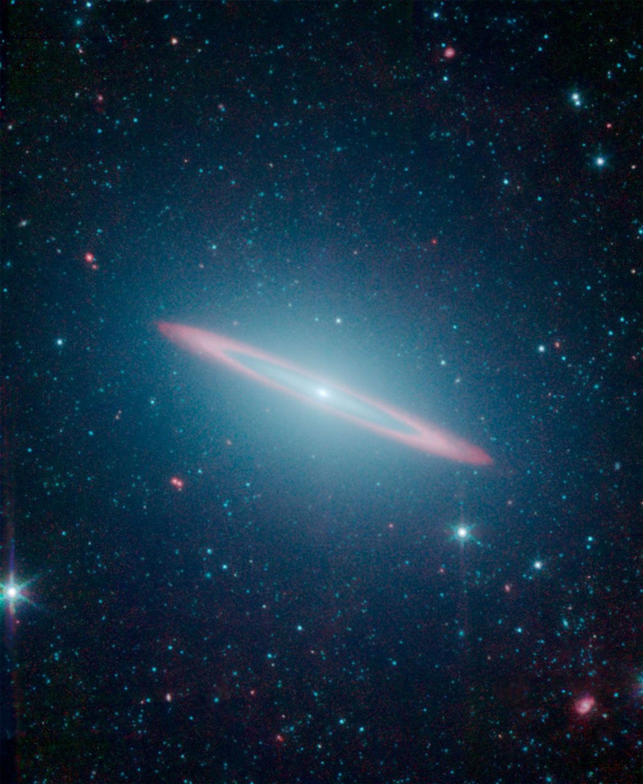 This infrared vision of NASA's Spitzer Space Telescope has revealed that the Sombrero galaxy, named after its appearance in visible light to a wide-brimmed hat, is in fact two galaxies in one.