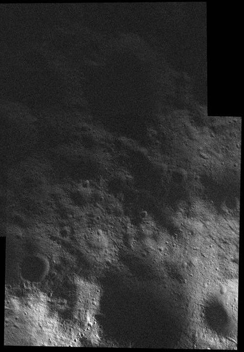 This mosaic of the surface of asteroid Vesta was made from images obtained by NASA's Dawn spacecraft while the area was entirely in the sun's shadow. Light reflecting off of other areas of Vesta provides the only illumination.