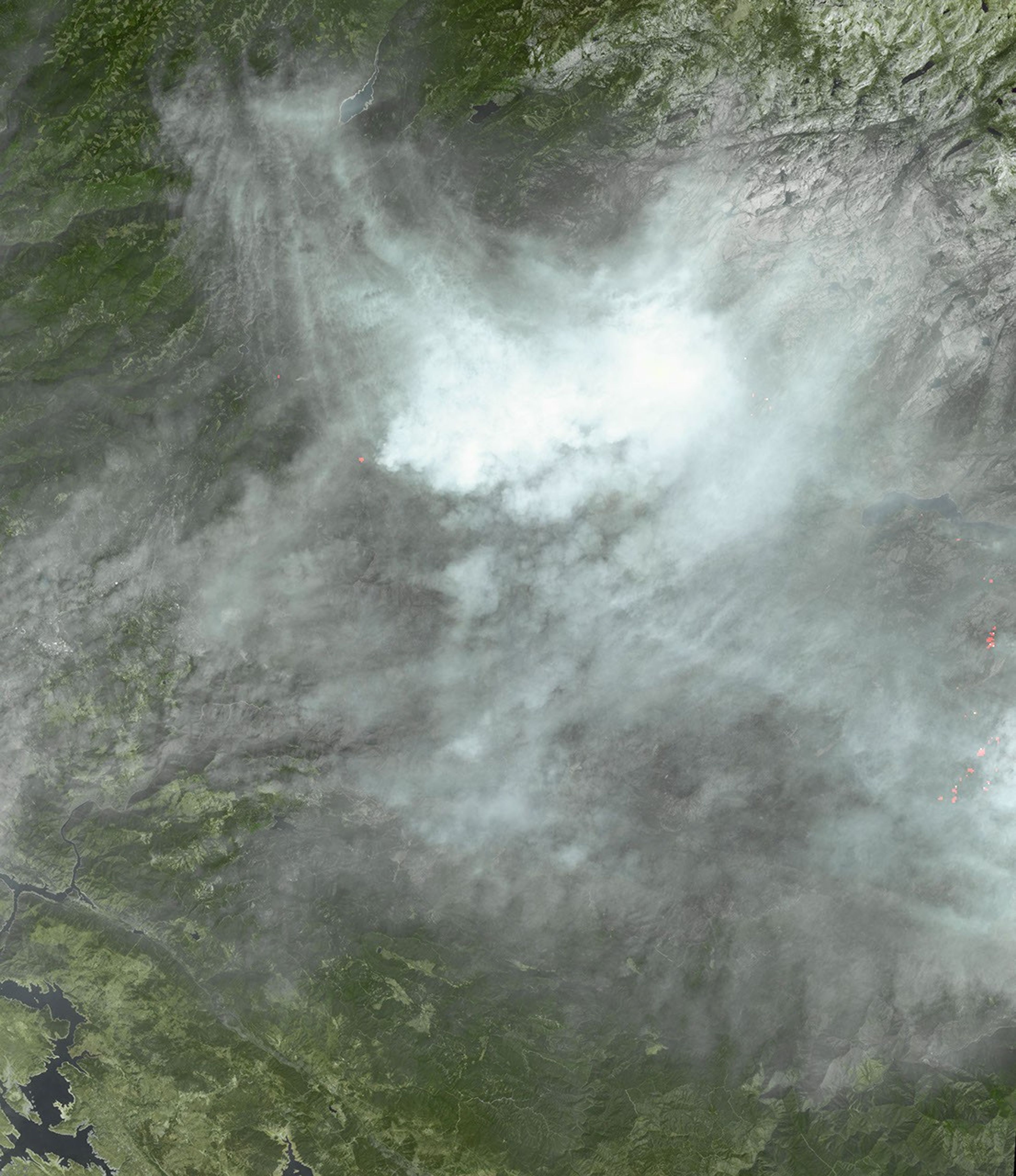 This image, acquired by NASA's Terra spacecraft, shows the Rim Fire in and around Yosemite National Park in California after it was 80 percent contained.