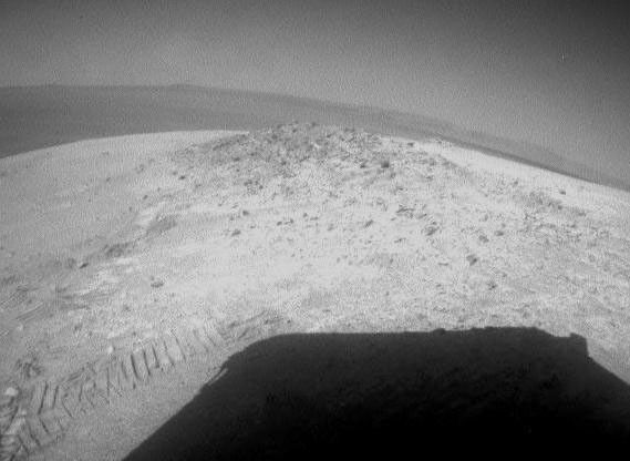 NASA's Mars Exploration Rover Opportunity drove about 12 feet (3.67 meters) on May 8, 2012, after spending 19 weeks working on the north slope of an outcrop called Greeley Haven while solar power was too low for driving during the Martian winter.