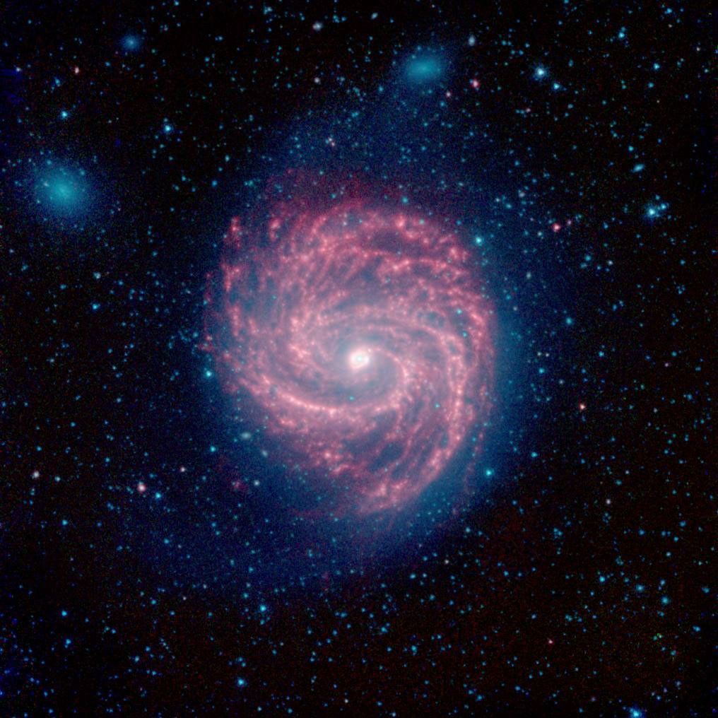This infrared image, from NASA's Spitzer Space Telescope, of M100 is a classic example of a grand design spiral galaxy, with prominent and well-defined spiral arms winding from the hot center, out to the cooler edges of the galaxy.
