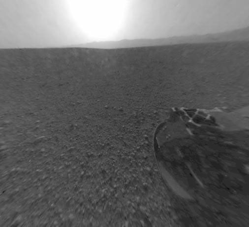 This is a version of one of the first images taken by a rear Hazard-Avoidance camera on NASA's Curiosity rover and shows part of the rim of Gale Crater, which is a feature the size of Connecticut and Rhode Island combined.