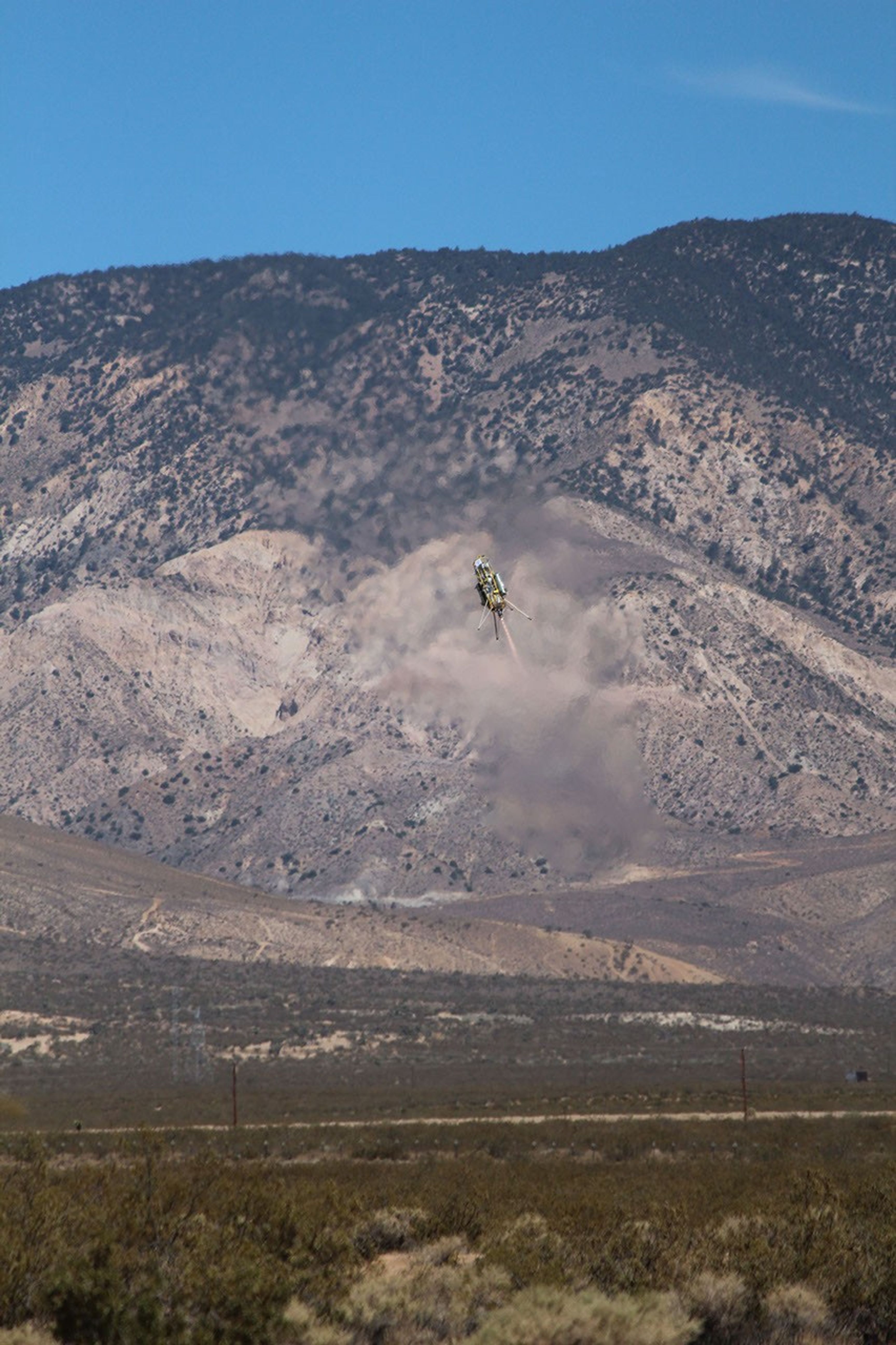 This image was taken during a flight test of JPL's Autonomous Descent and Ascent Powered-Flight Testbed (ADAPT). The testbed was flown aboard a Masten Space System Xombie rocket.-Flight Testbed (ADAPT).
