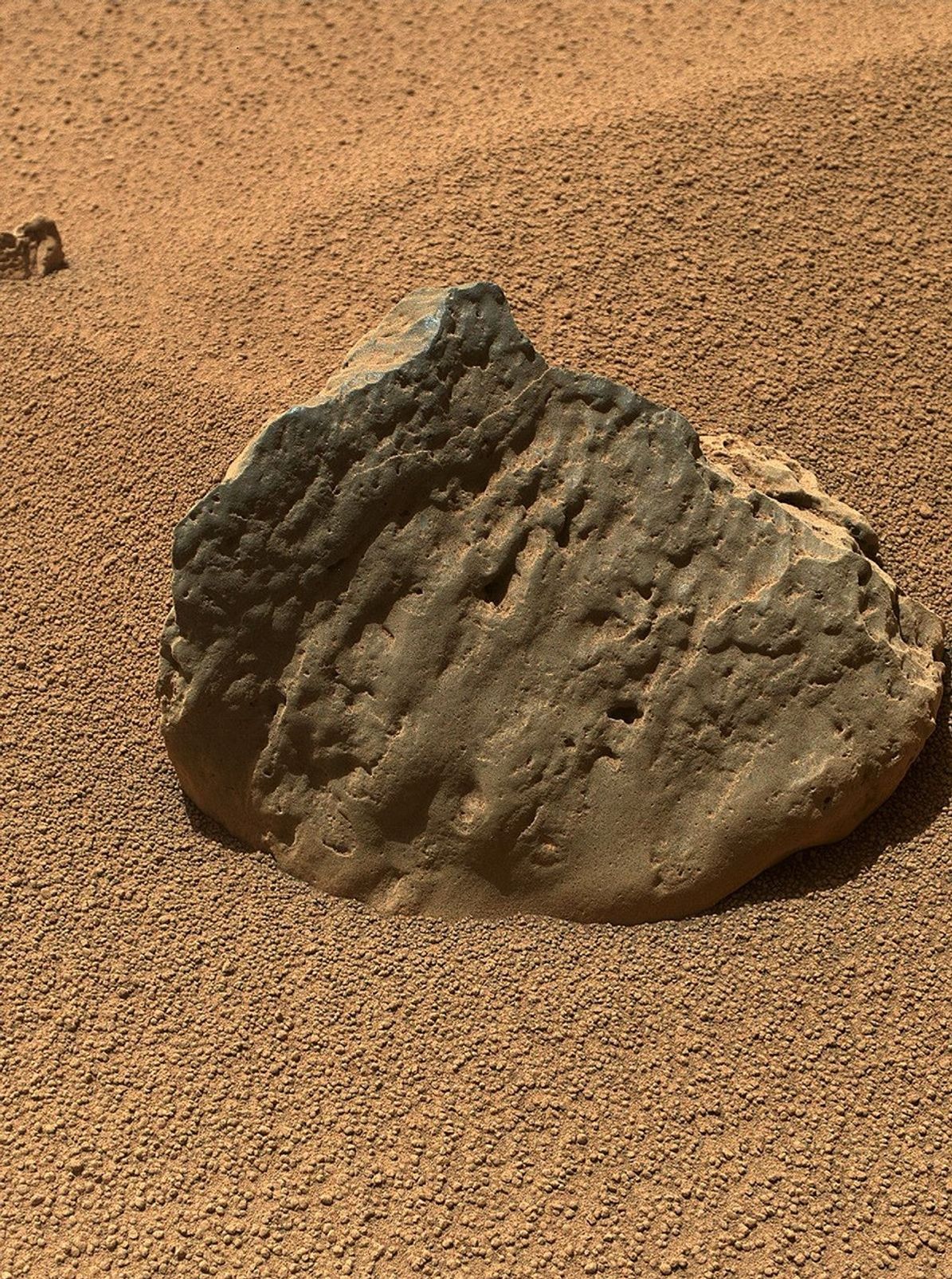 'Et-Then' is located near the rover's front left wheel, where the rover has been stationed while scooping soil at the site called 'Rocknest' in this image from NASA's Curiosity spacecraft.