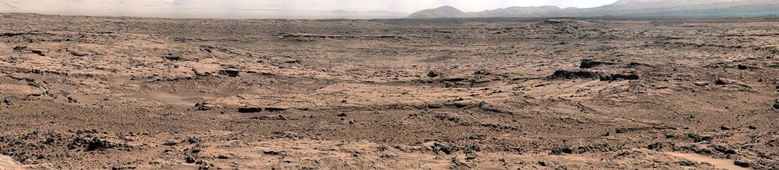 The image, which has been white-balanced to show what the rocks and soils in it would look like if they were on Earth, is a mosaic of images taken at a site called 'Rocknest' while NASA's Mars rover Curiosity was working.