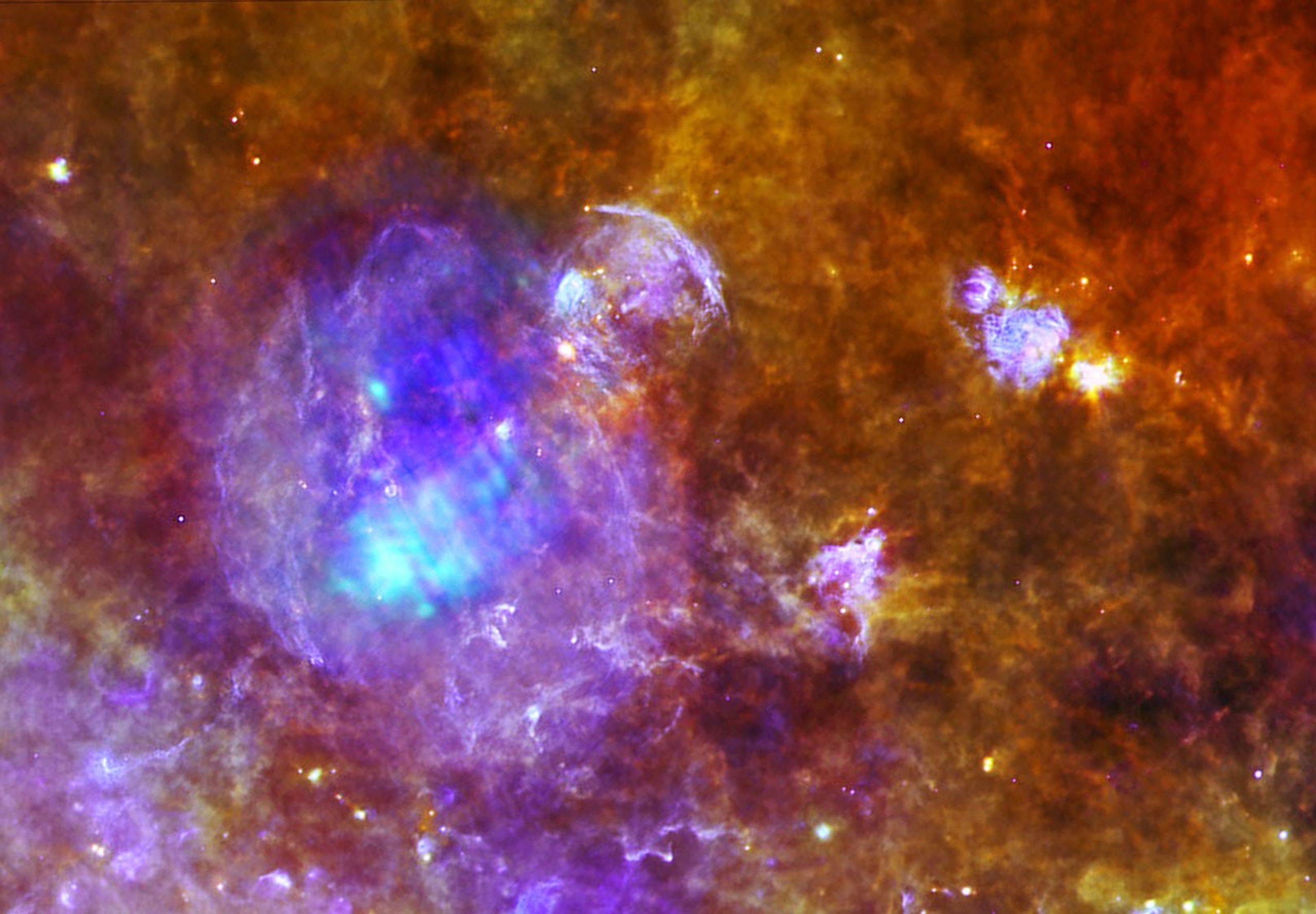 W44 is located around 10,000 light-years away, within a forest of dense star-forming clouds in the constellation of Aquila, the Eagle. This image combines data from ESA's Herschel and XXM-Newton space observatories.