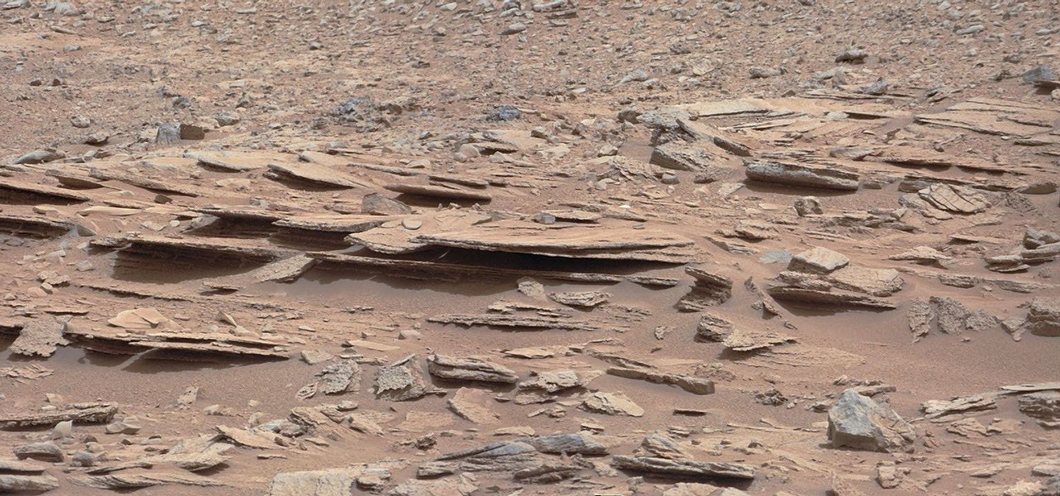 The NASA Mars rover Curiosity used its Mast Camera (Mastcam) during the mission's 120th Martian day, or sol (Dec. 7, 2012), to record this view of a rock outcrop informally named 'Shaler.'