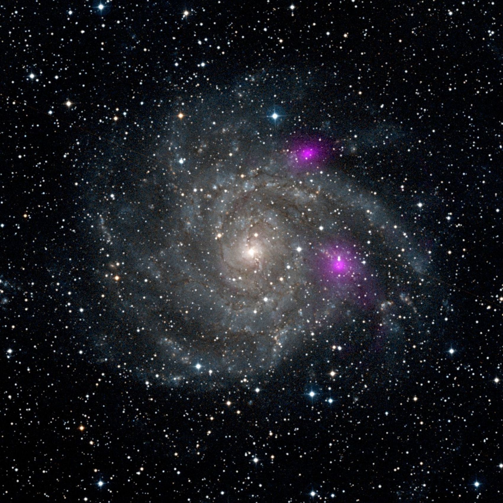 This new view of spiral galaxy IC 342, also known as Caldwell 5, includes data from NASA's Nuclear Spectroscopic Telescope Array, or NuSTAR. IC 342 lies 7 million light-years away in the Camelopardalis constellation.