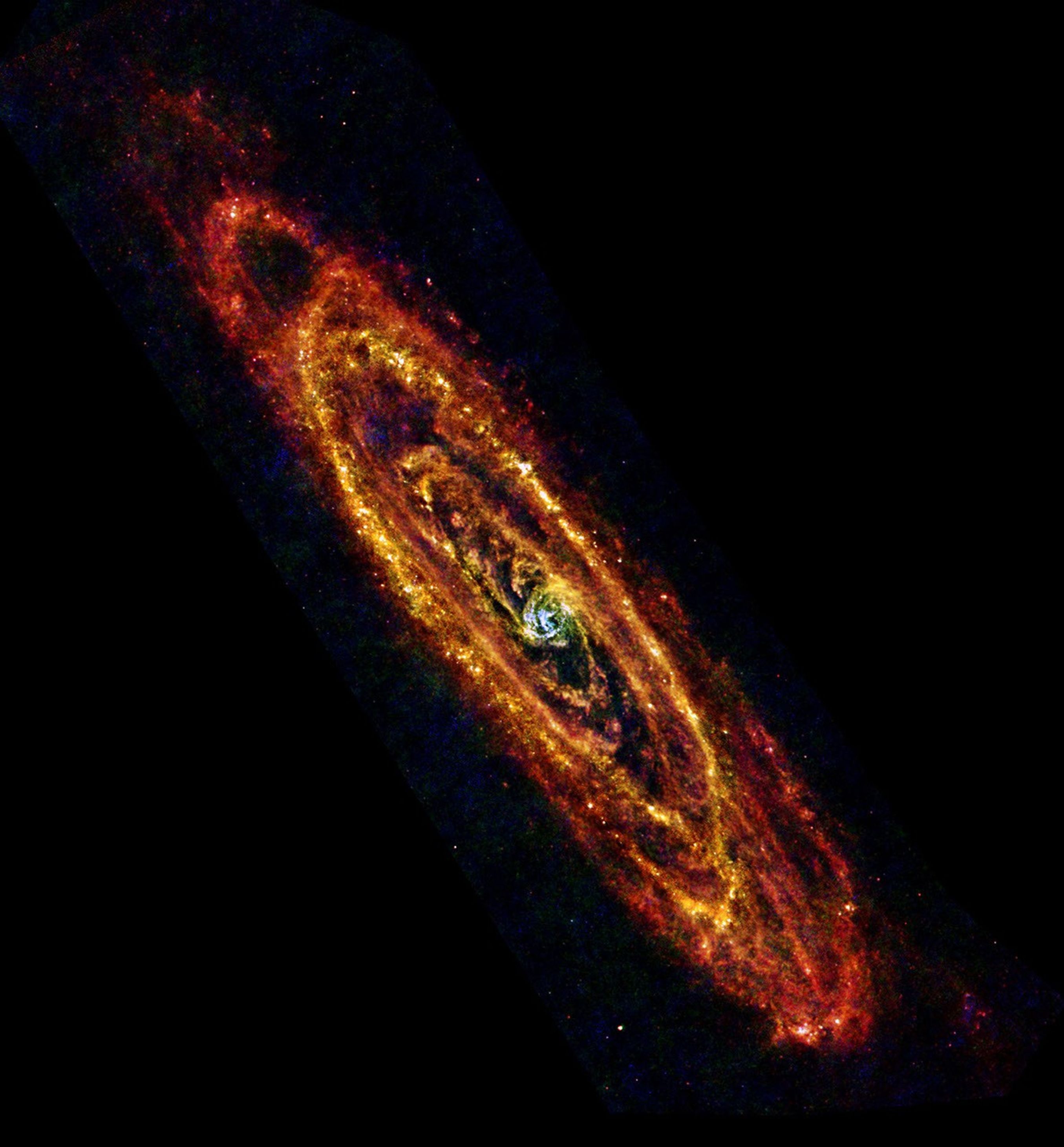 In this new view of the Andromeda, also known as M31, galaxy from the Herschel space observatory, cool lanes of forming stars are revealed in the finest detail yet. M31 is the nearest major galaxy to our own Milky Way at a distance of 2.5 million light-ye