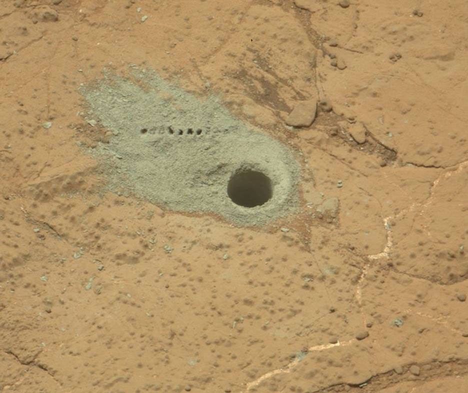 The Chemistry and Camera (ChemCam) instrument on NASA's Mars rover Curiosity was used to check the composition of gray tailings from the hole in rock target 'Cumberland' that the rover drilled on May 19, 2013.