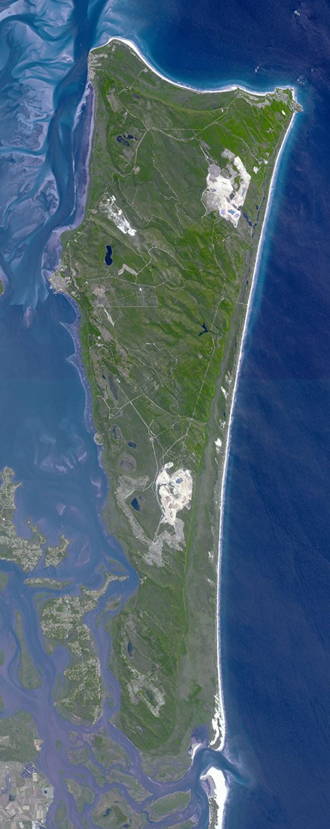 This image from NASA's Terra spacecraft shows North Stradbroke Island, 30 km southeast of Brisbane, Australia, one of the largest sand islands in the world.