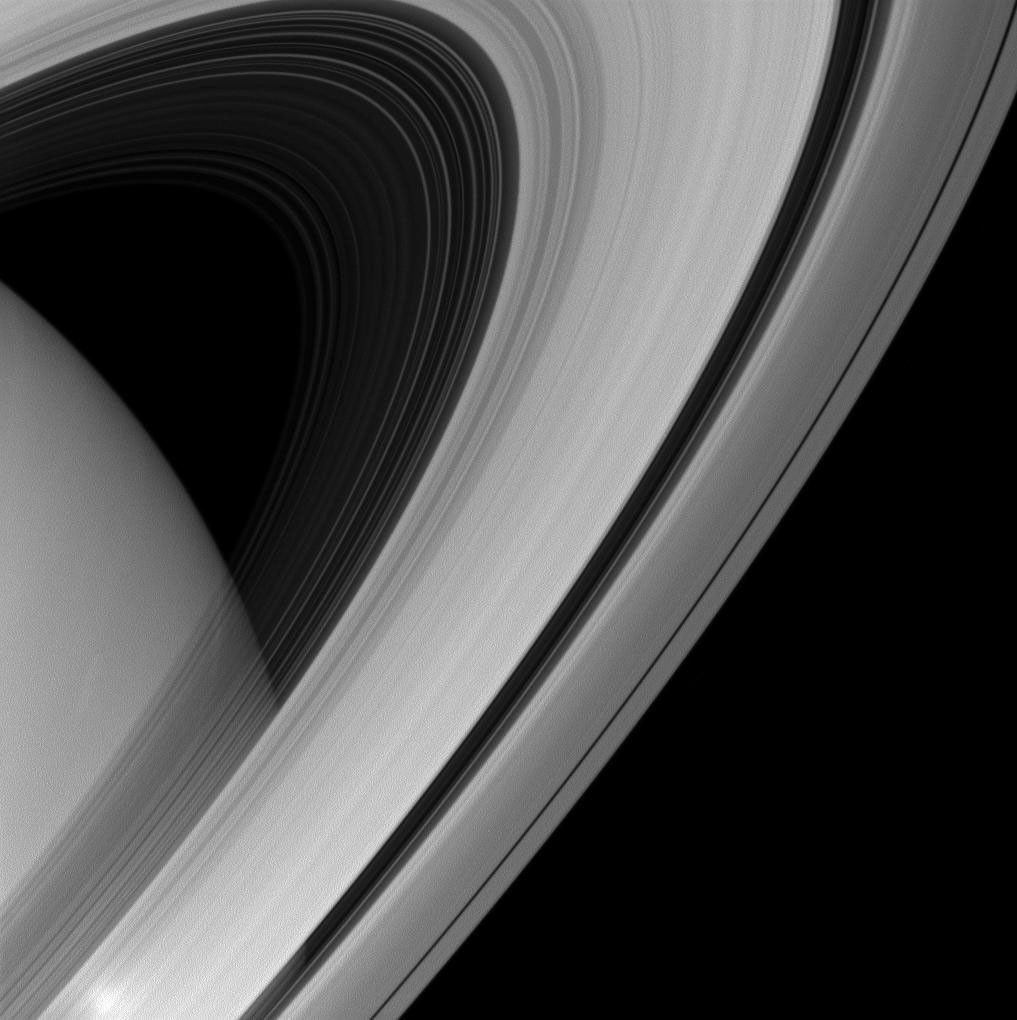 Saturn's rings appear to form a majestic arc over the planet in this image from NASA's Cassini spacecraft.