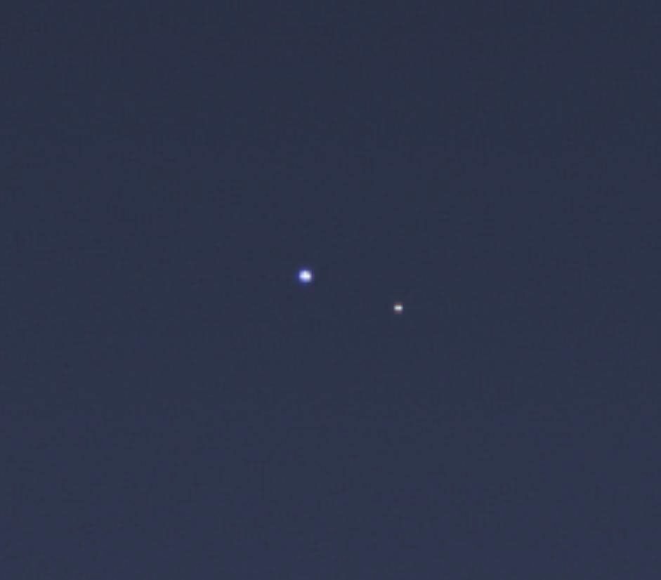 The cameras on NASA's Cassini spacecraft captured this rare look at Earth and its moon from Saturn orbit on July 19, 2013. The image has been magnified five times.