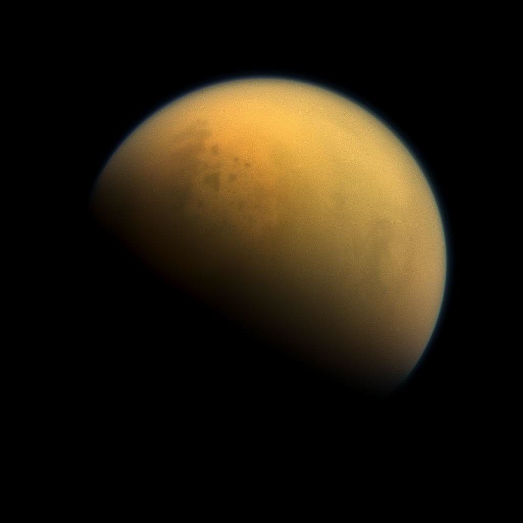 Using a special spectral filter, NASA's Cassini spacecraft was able to peer through the hazy atmosphere of Saturn's moon Titan. This image features the largest seas and some of the many hydrocarbon lakes that are present on Titan's surface.