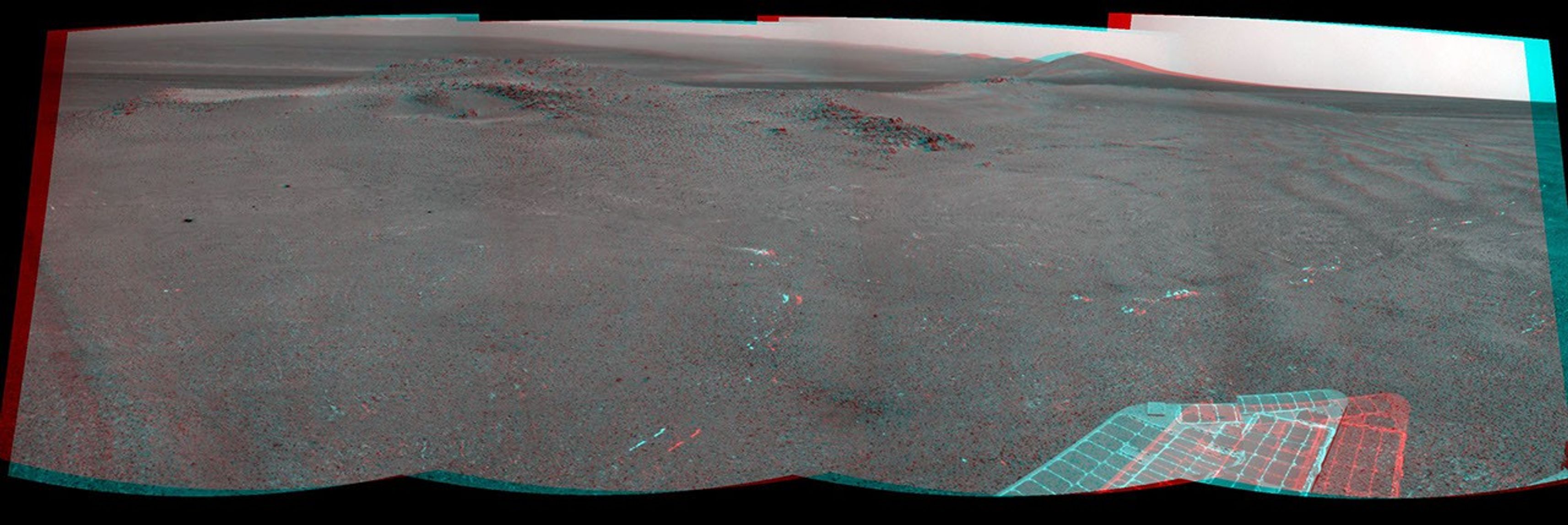 NASA's Mars Exploration Rover Opportunity recorded this 3D view of a rise called 'Nobbys Head' during a stop on a multi-week southward drive between two raised segments of the west rim of Endeavour Crater.