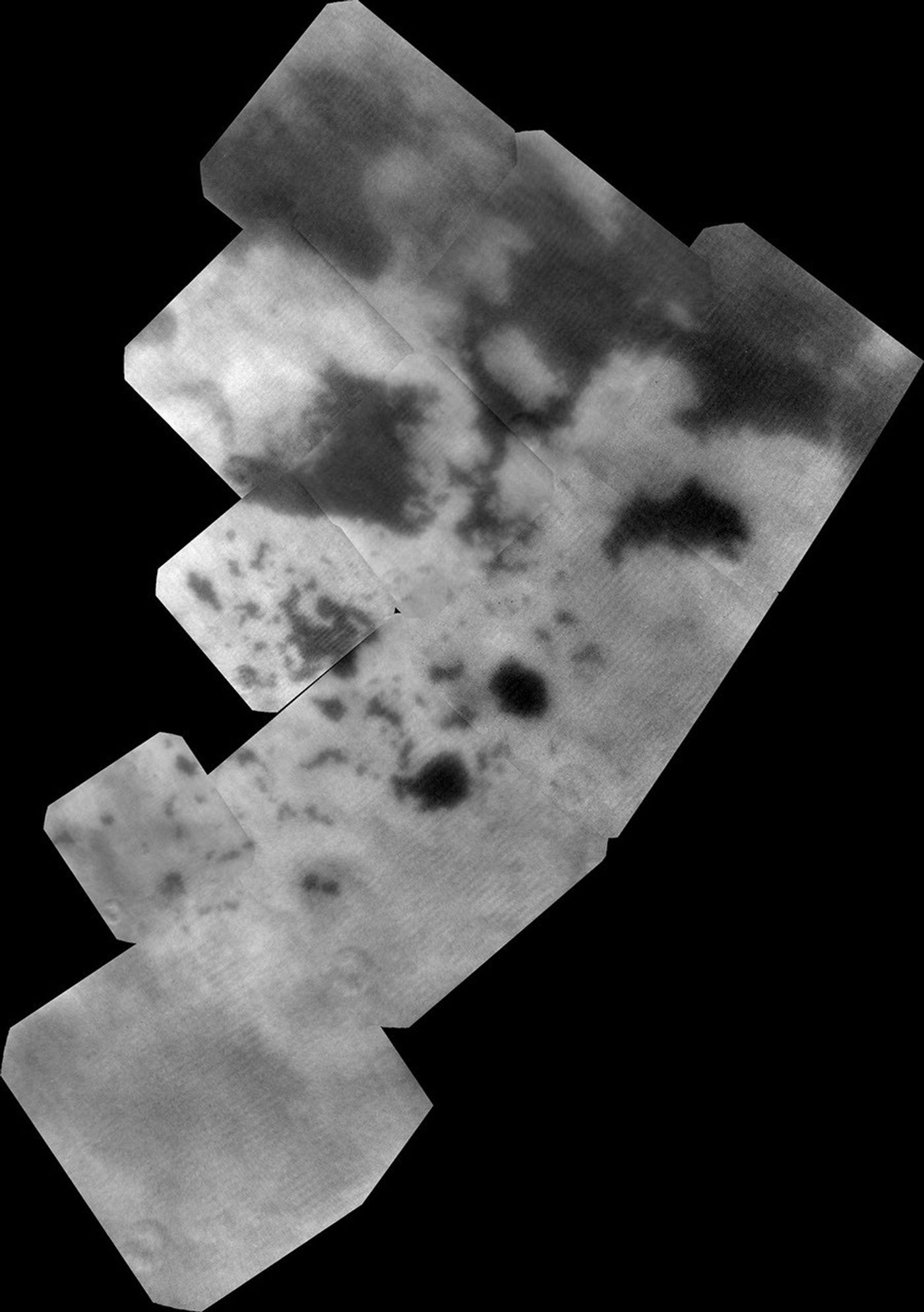 The vast hydrocarbon seas and lakes (dark shapes) near the north pole of Saturn's moon Titan sprawl out beneath the watchful eye of NASA's Cassini spacecraft. Scientists are studying images like these for clues about how Titan's hydrocarbon lakes formed.
