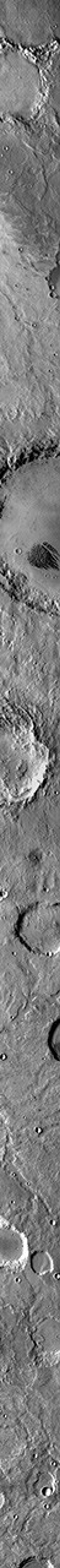 This infrared image, taken by NASA's 2001 Mars Odyssey spacecraft, shows the feature called 'White Rock.' The feature is dark, indicating that it is cooler than the surroundings.