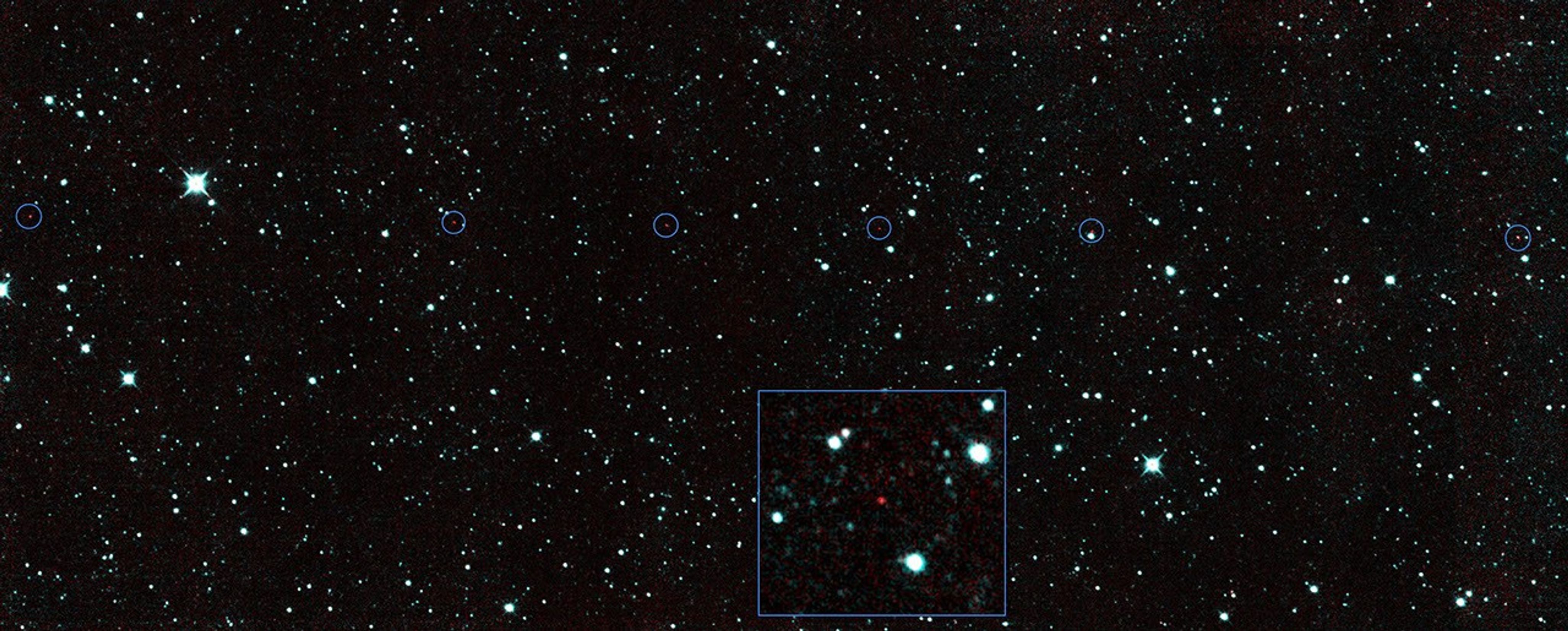 The six red dots in this composite picture indicate the location of the first new near-Earth asteroid, called 2013 YP139, as seen by NASA's NEOWISE.