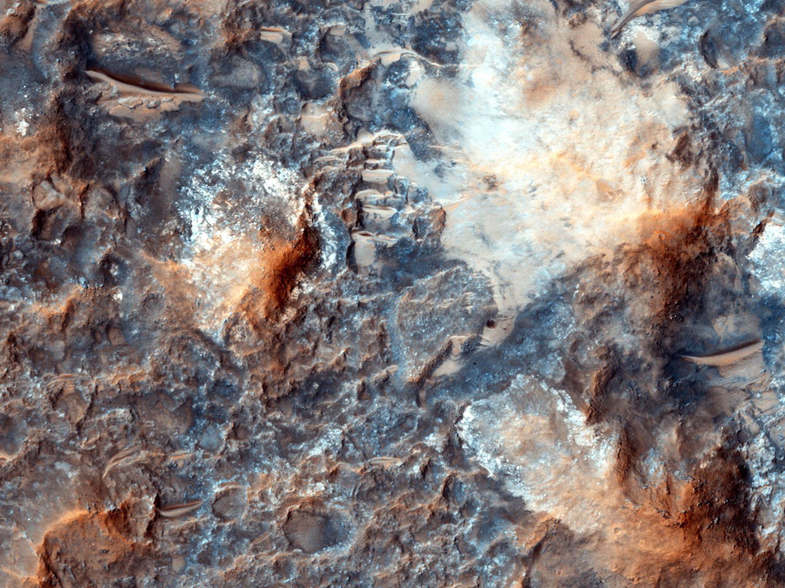 'Megabreccia' is a term used to describe jumbled, fragmented blocks of rock larger than 1 meter (1.09 yard) across. This image was observed by NASA's Mars Reconnaissance Orbiter.