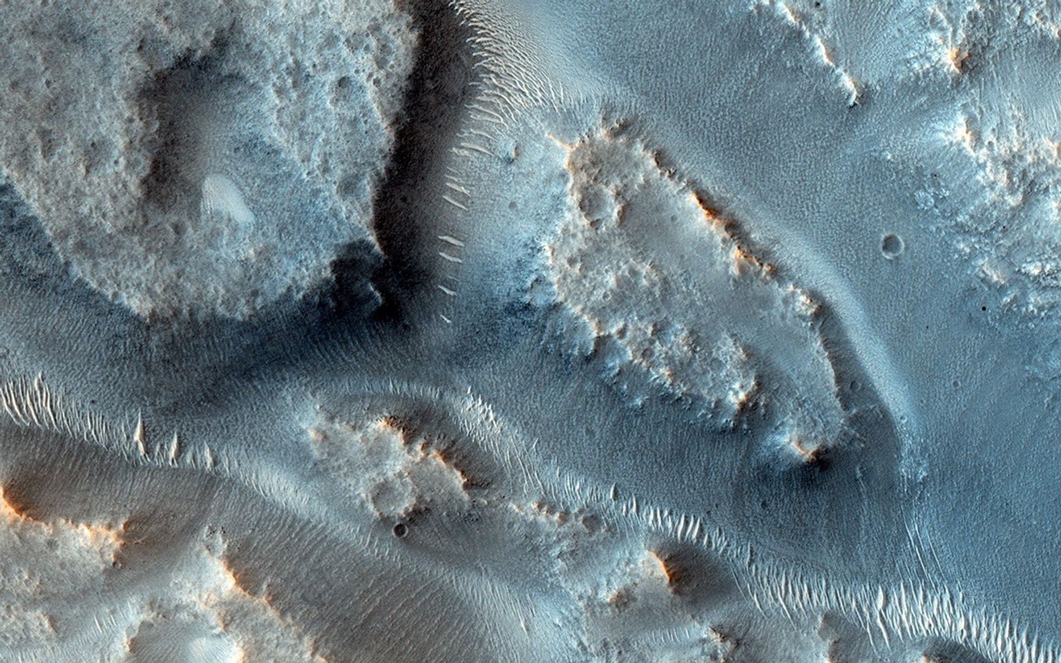 Many valleys occur all over Mars that reveal an extensive ancient history of liquid water erosion. This image from NASA's Mars Reconnaissance Orbiter shows a complex valley network near Idaeus Fossae.