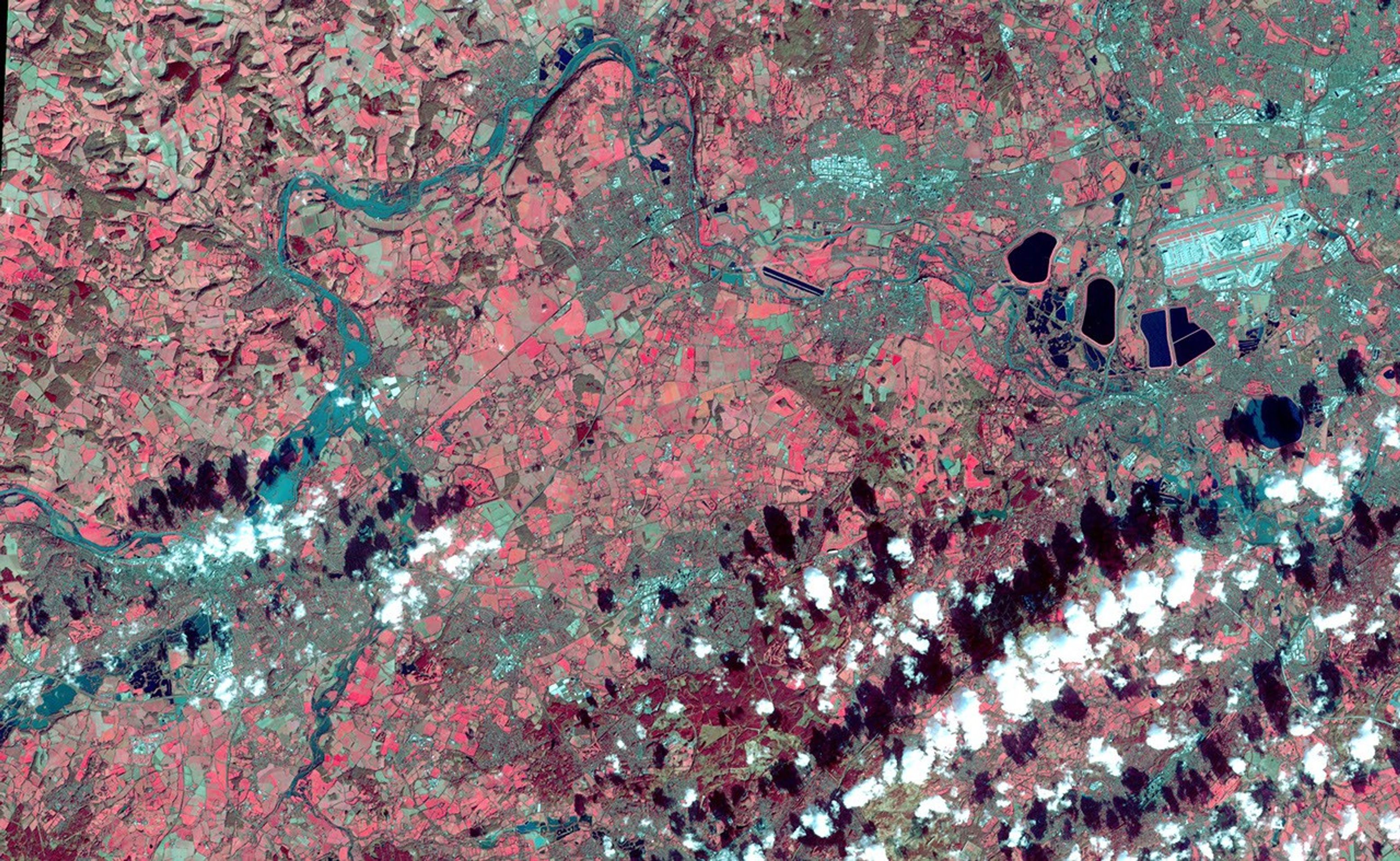 This image acquired by NASA's Terra spacecraft depicts the high water levels and flooding along the Thames River west of London as record-breaking rains covered the United Kingdom in January and February.