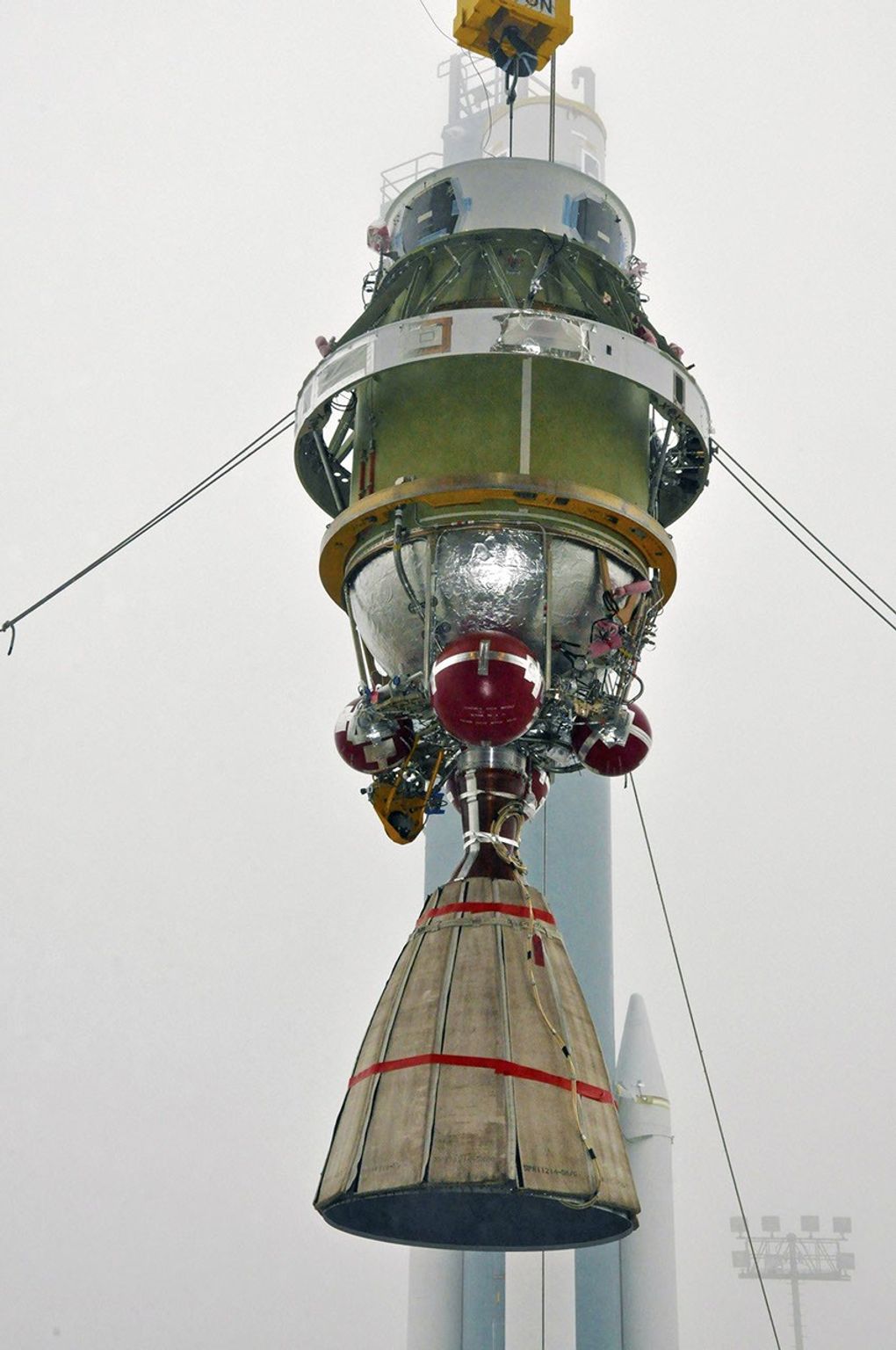 The Delta II second stage for NASA's Orbiting Carbon Observatory-2 mission, or OCO-2, is lifted to the top of the mobile service tower at Space Launch Complex 2 on Vandenberg Air Force Base in California.