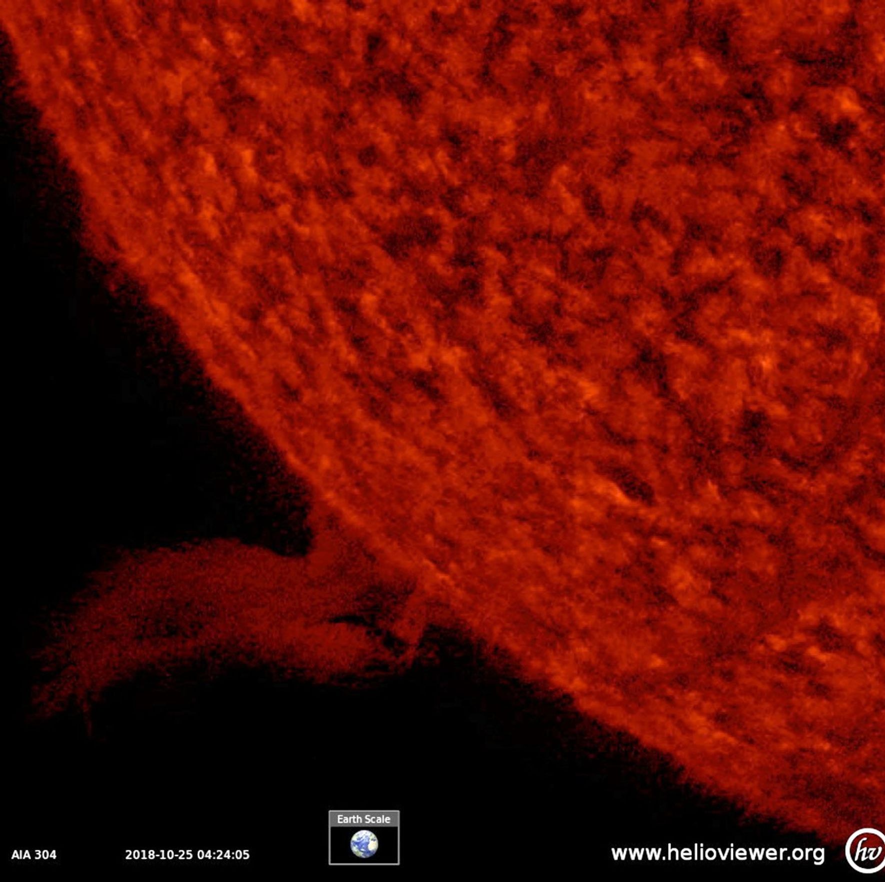 NASA's Solar Dynamics Observatory shows that a solar prominence rose up above the Sun's surface, twisted and spun around, then became elongated and broke away. (Oct. 24-25, 2018).
