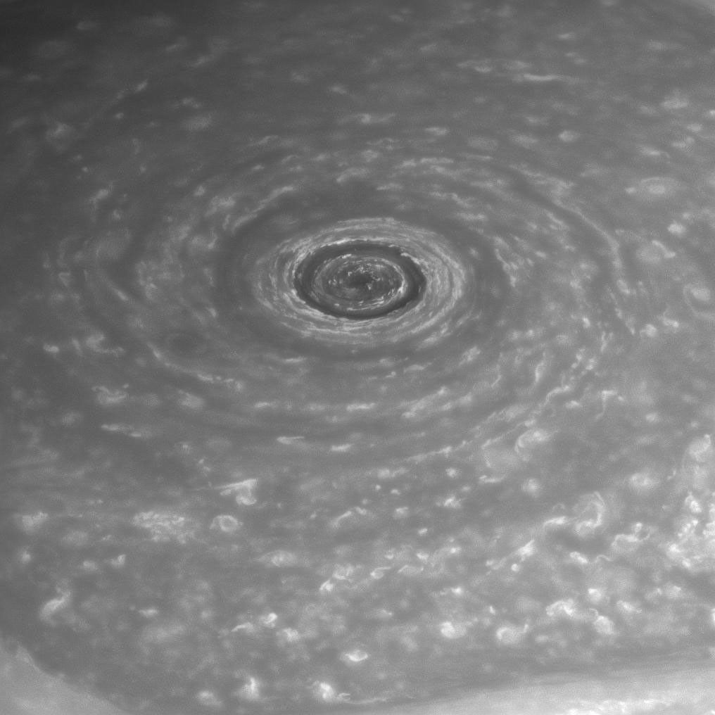 Like a giant eye for the giant planet, Saturn's great vortex at its north pole appears to stare back at Cassini as NASA's Cassini spacecraft stares at it.