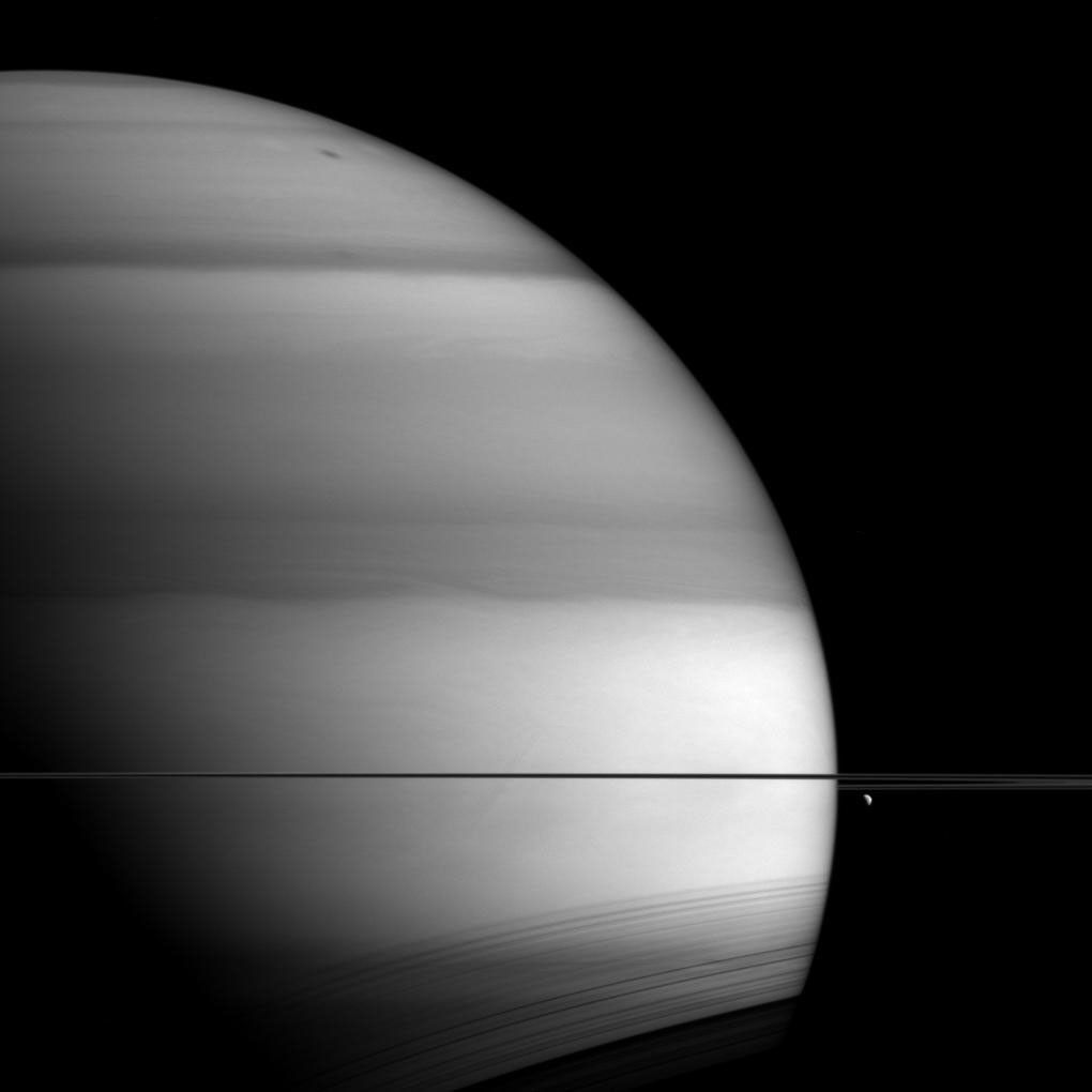 The soft, bright-and-dark bands displayed by Saturn in this view from NASA's Cassini spacecraft are the signature of methane in the planet's atmosphere.