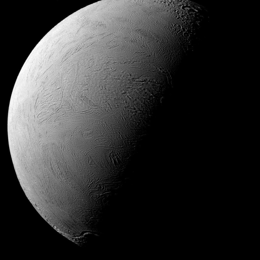 NASA's Cassini spacecraft captured this view of Saturn's moon Enceladus that shows wrinkled plains that are remarkably youthful in appearance, being generally free of large impact craters.
