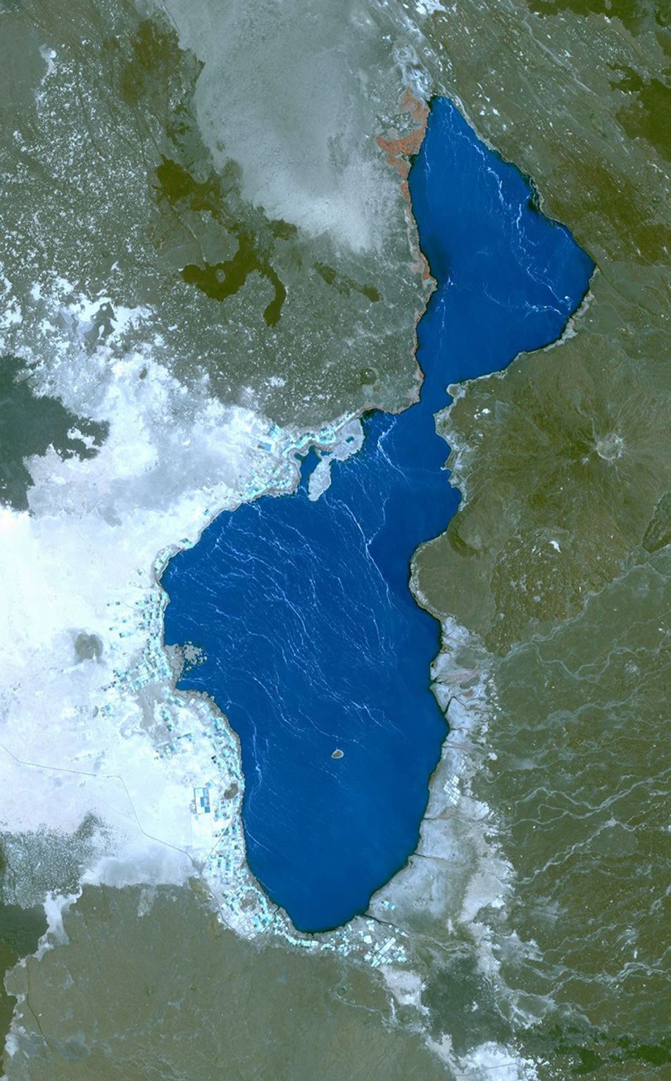 Lake Afrera is a hypersaline lake located in the Danakil Depression in northern Ethiopia where rock salt has been mined for centuries. This image was acquired by NASA's Terra spacecraft.