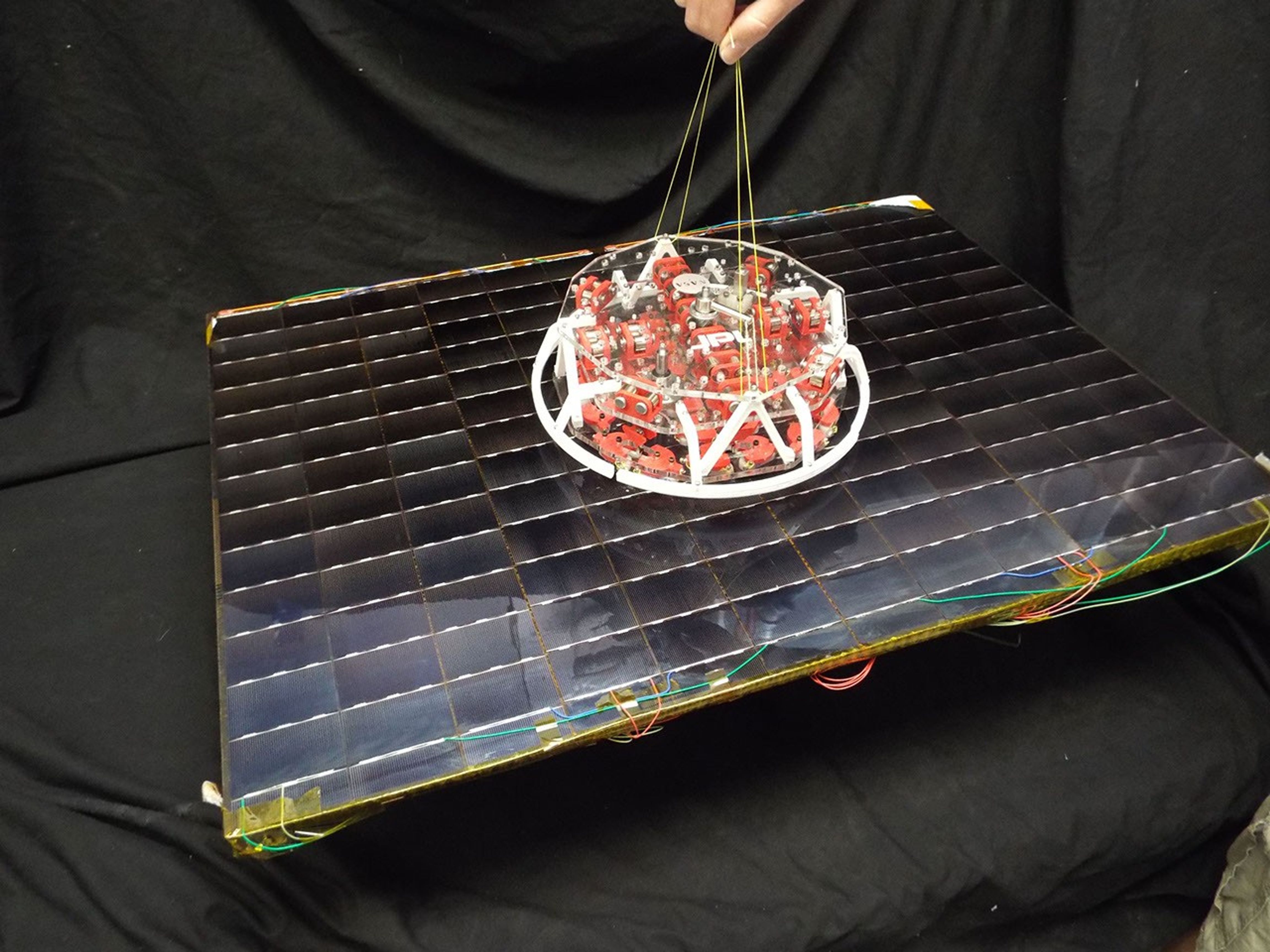 Scientists at NASA's Jet Propulsion Laboratory have developed a tool for grappling non-cooperative objects that incorporates gecko-like adhesives. The adhesives are reusable and can be turned on and off.