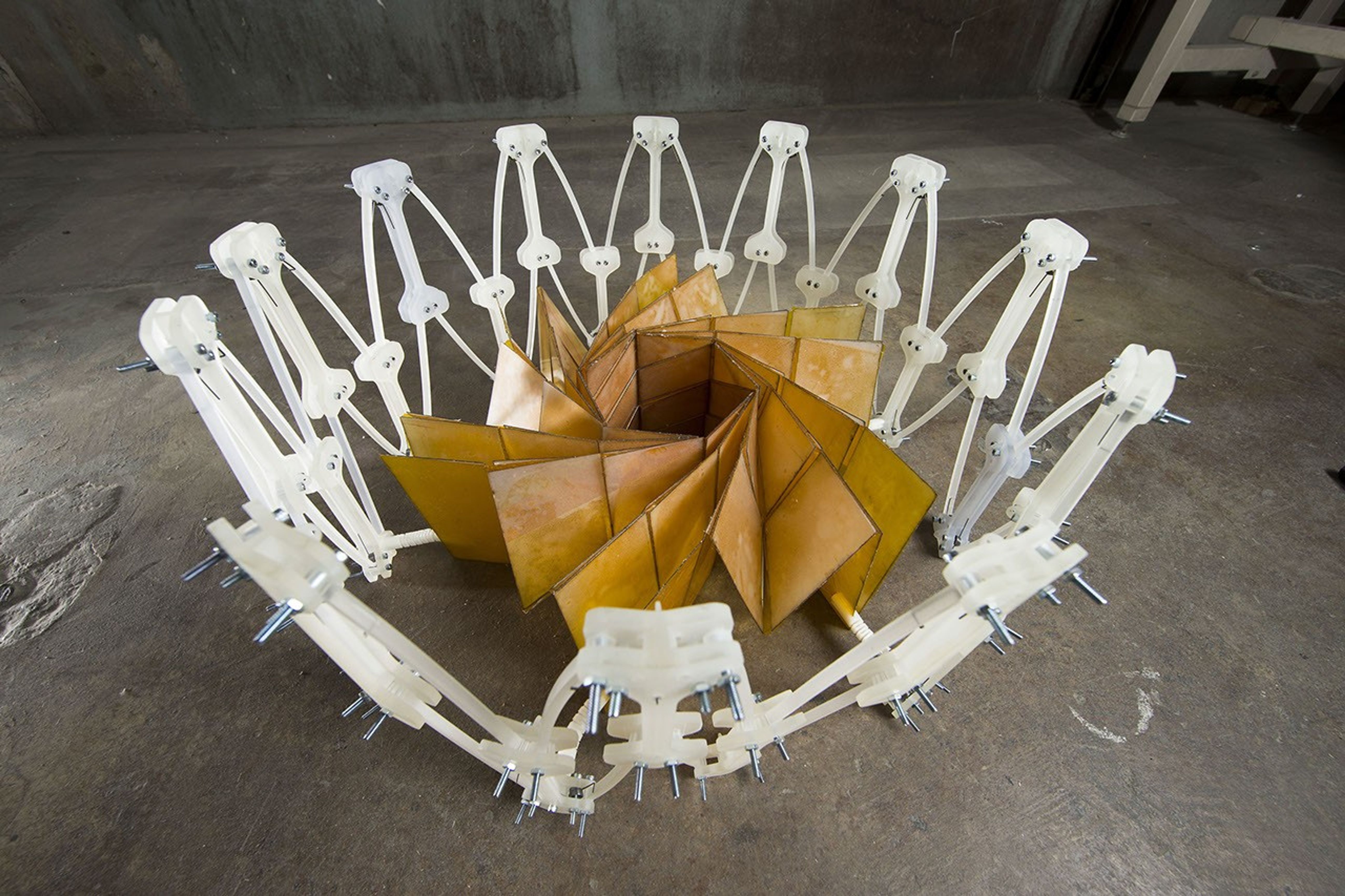 Researchers at NASA's Jet Propulsion Laboratory, Pasadena, California, and Brigham Young University, Provo, Utah, collaborated to construct a prototype of a solar panel array that folds up in the style of origami, to make for easier deployment.