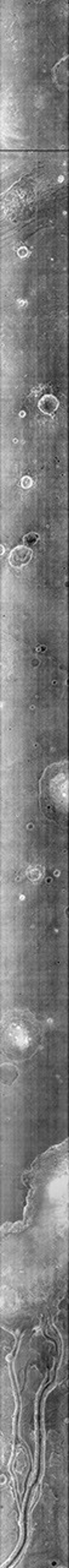 Near the bottom of this nighttime image captured by NASA's 2001 Mars Odyssey spacecraft are several channels. The dusty channel floors are darker (colder) than the rocky walls.