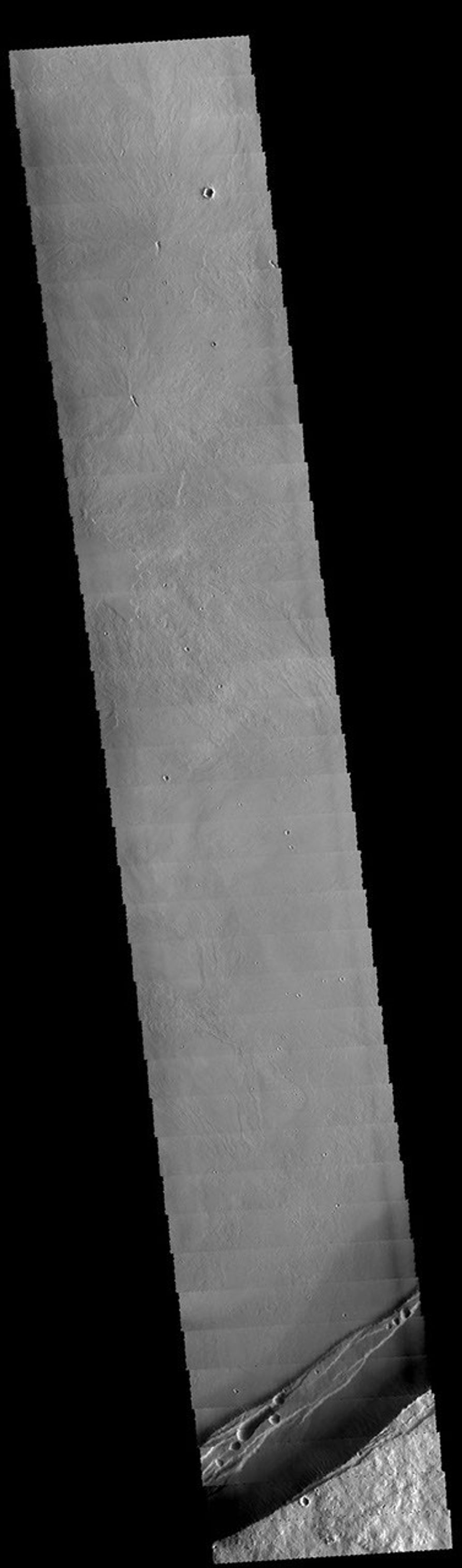 This image captured by NASA's 2001 Mars Odyssey spacecraft shows part of the caldera at the summit of Arsia Mons.